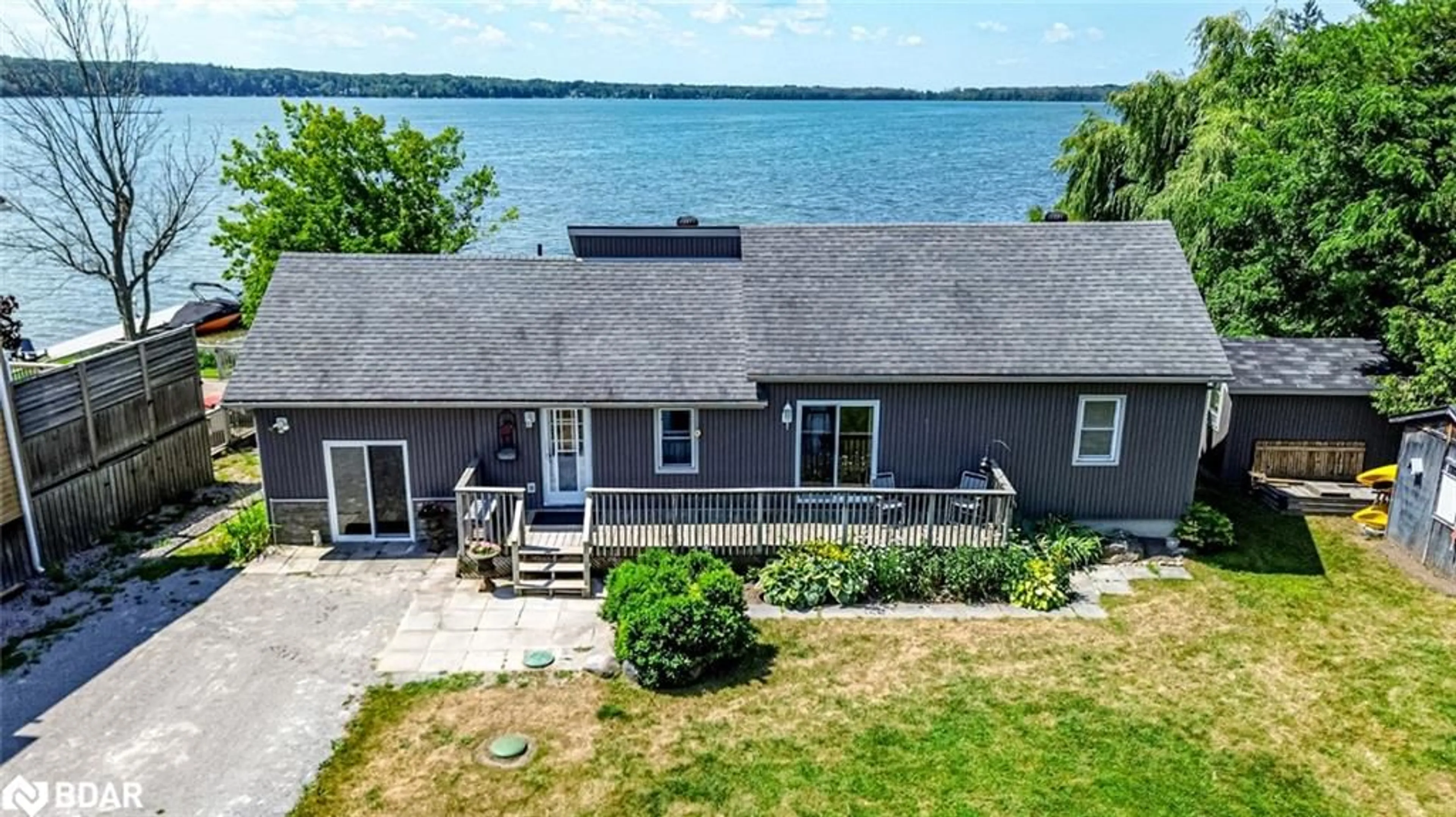 A pic from outside/outdoor area/front of a property/back of a property/a pic from drone, water/lake/river/ocean view for 5580 Penetanguishene Rd, Elmvale Ontario L0L 1P0