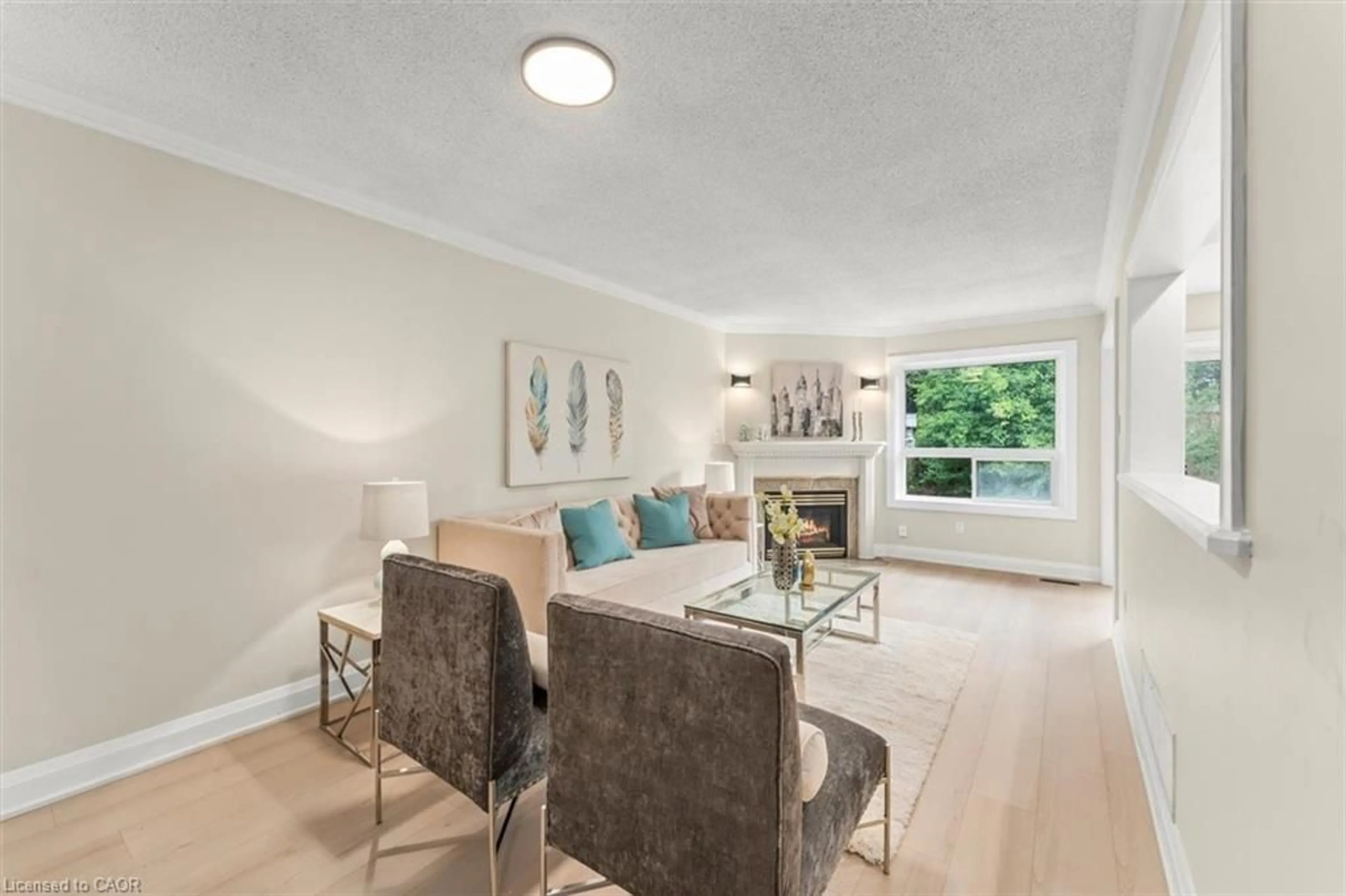 Living room with furniture, unknown for 86 Prairie Rose Cir, Brampton Ontario L6R 1R7