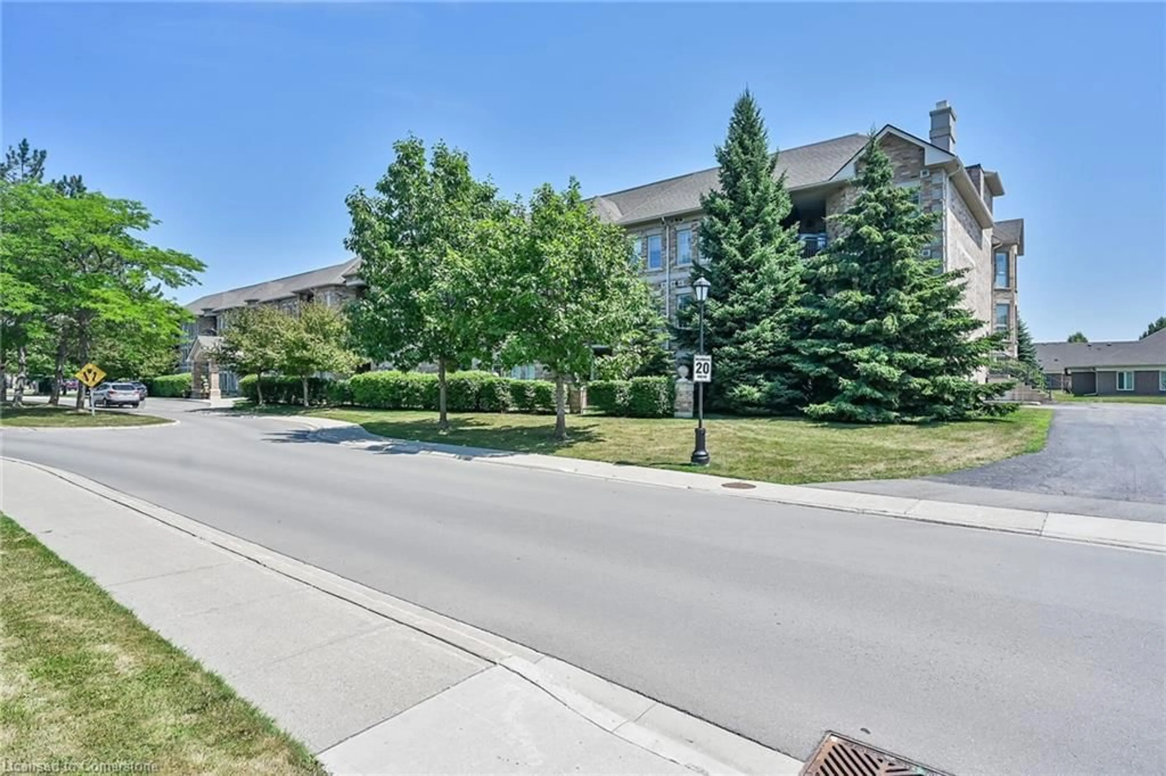 A pic from outside/outdoor area/front of a property/back of a property/a pic from drone, street for 59 Critzia Dr #205, Mount Hope Ontario L0R 1W0