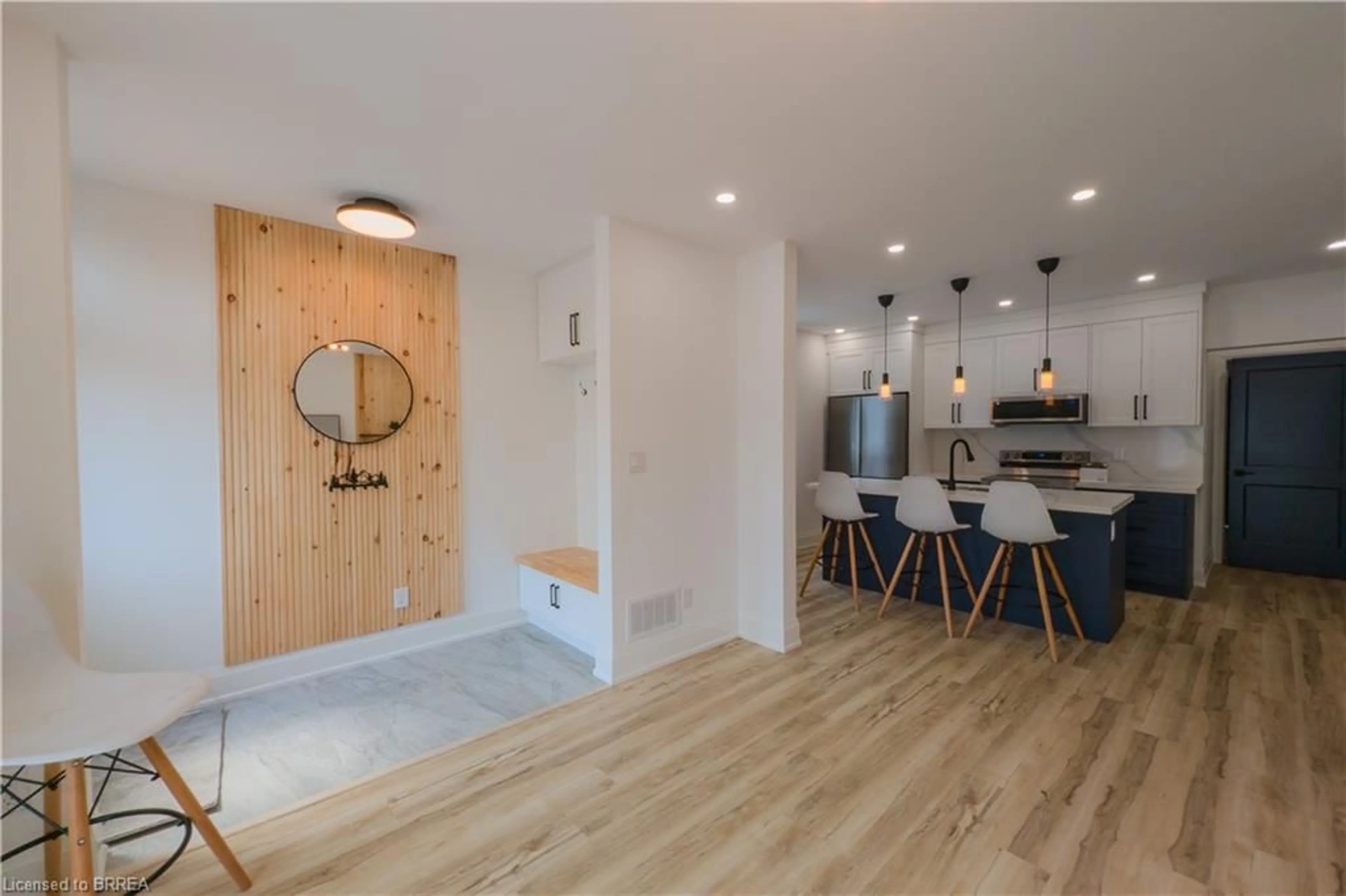 Open concept kitchen, wood/laminate floor for 91 Princess St, Hamilton Ontario L8L 3L1