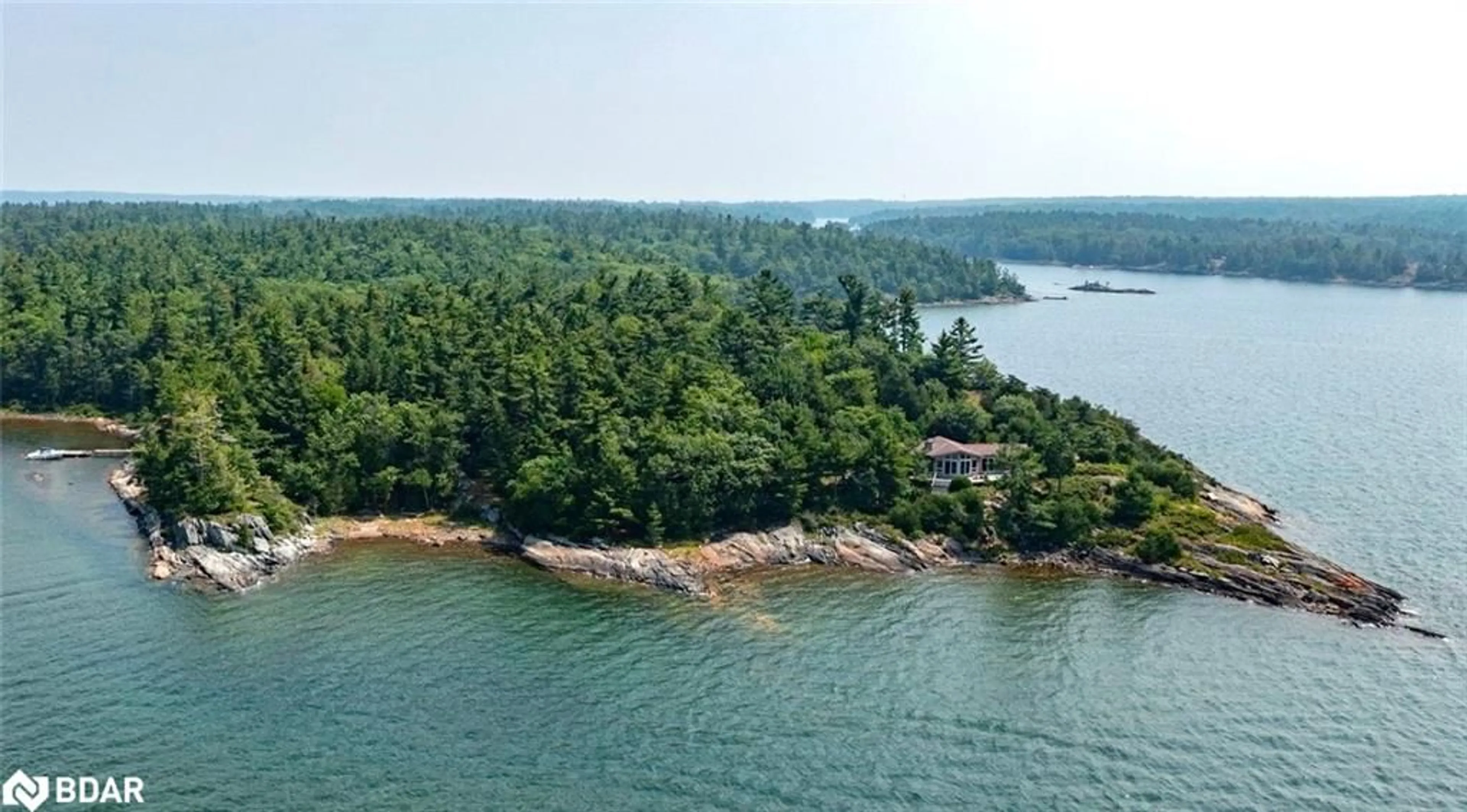 A pic from outside/outdoor area/front of a property/back of a property/a pic from drone, water/lake/river/ocean view for 3 Island 65c, Carling Ontario P0G 1G0