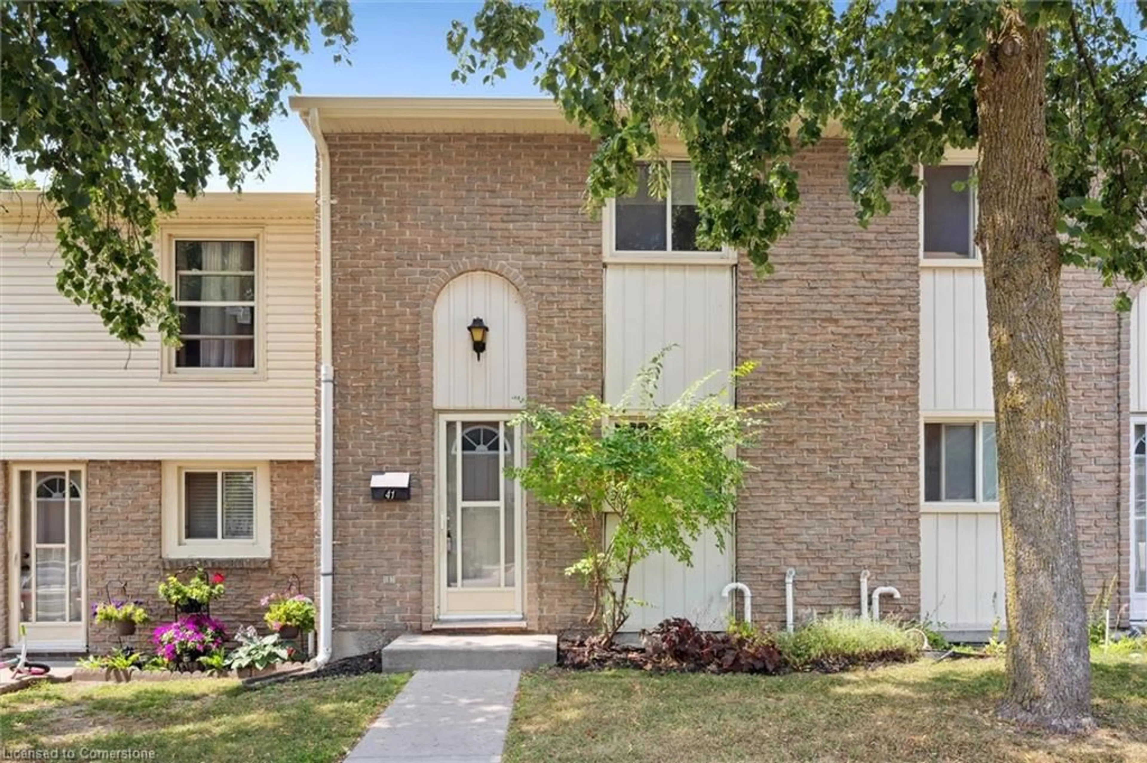 Home with brick exterior material, street for 165 Green Valley Dr #41, Kitchener Ontario N2P 1K3