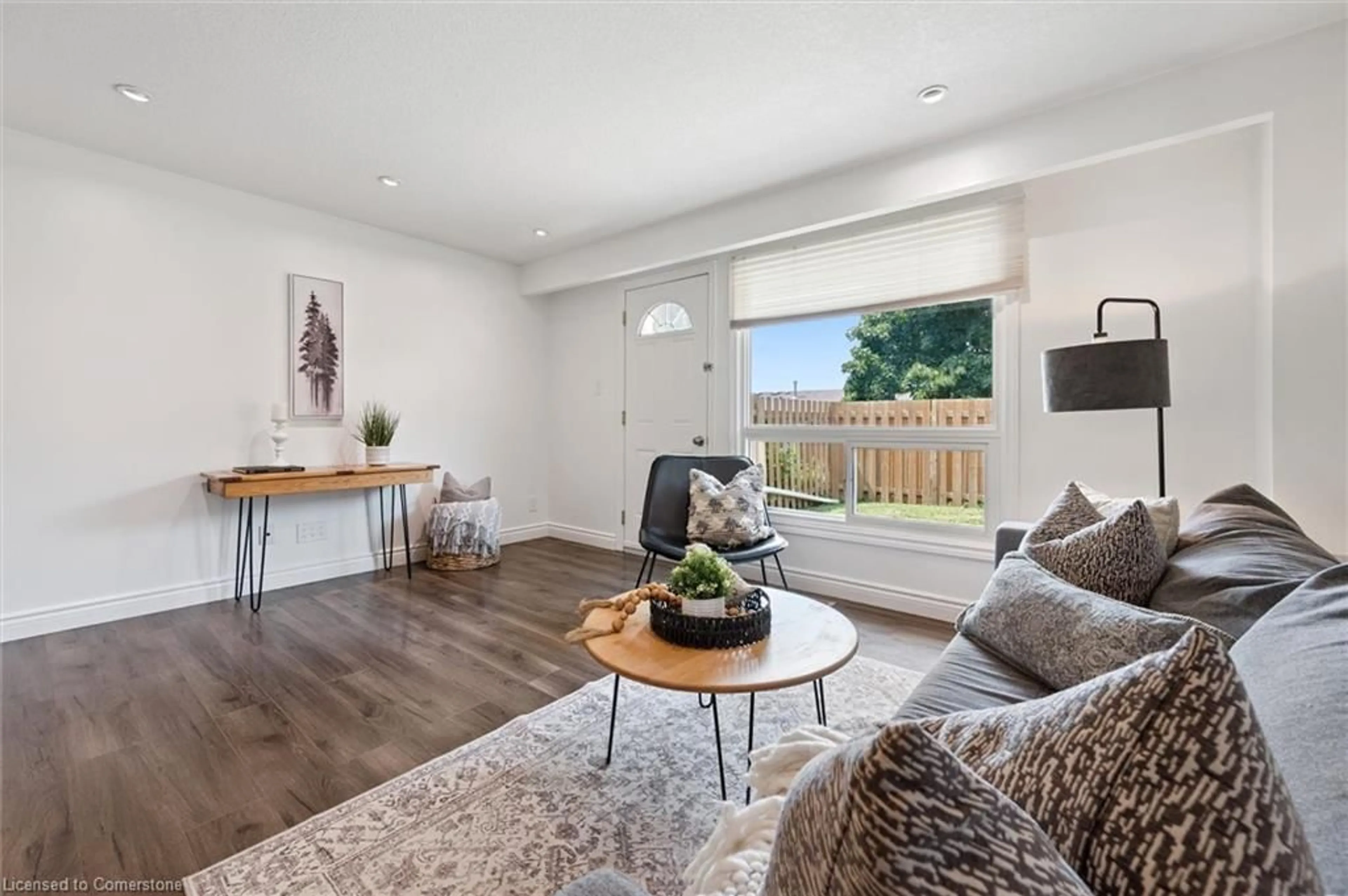 Living room with furniture, wood/laminate floor for 165 Green Valley Dr #41, Kitchener Ontario N2P 1K3