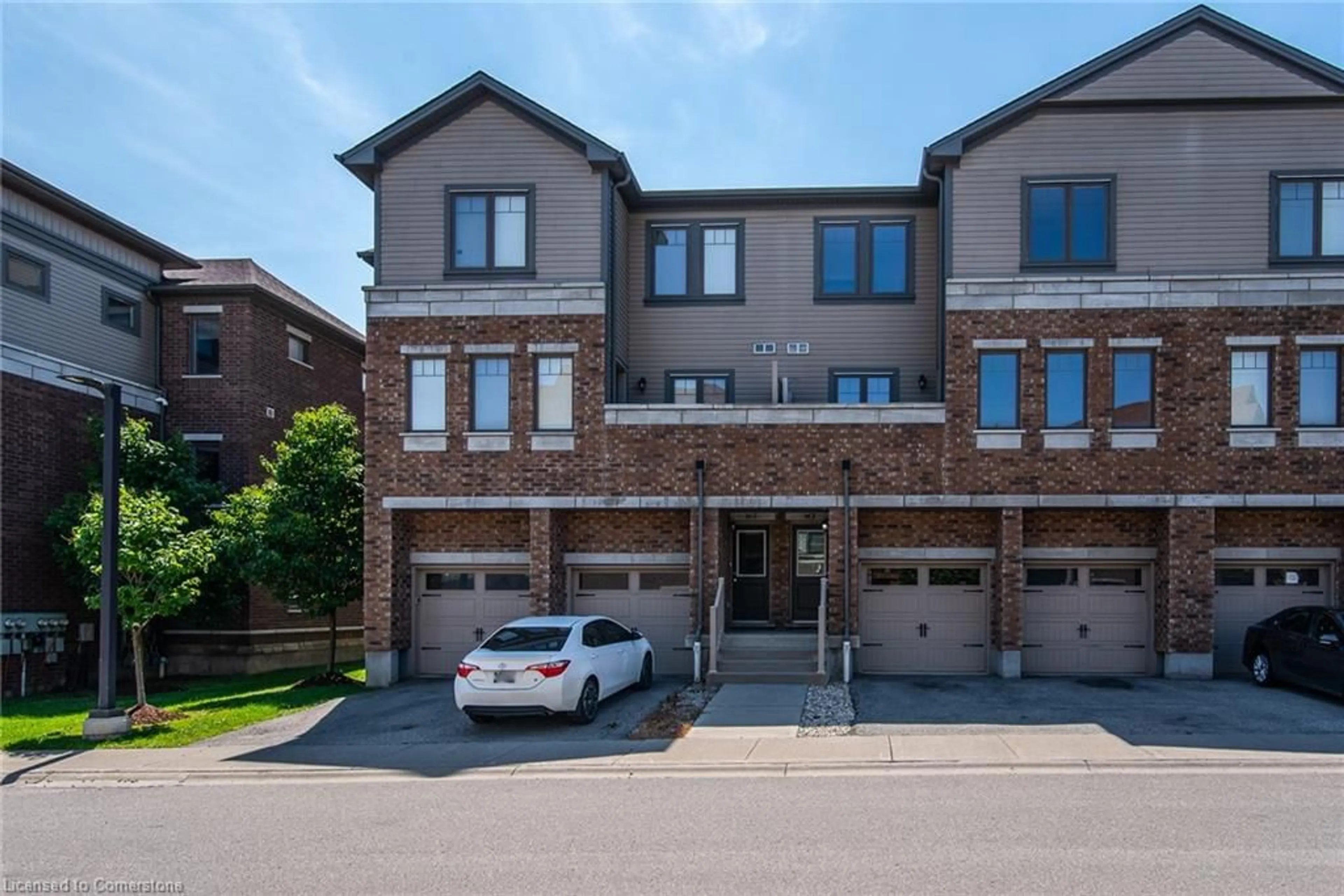 Home with brick exterior material, street for 70 Willowrun Dr #H 3, Kitchener Ontario N2A 0J3