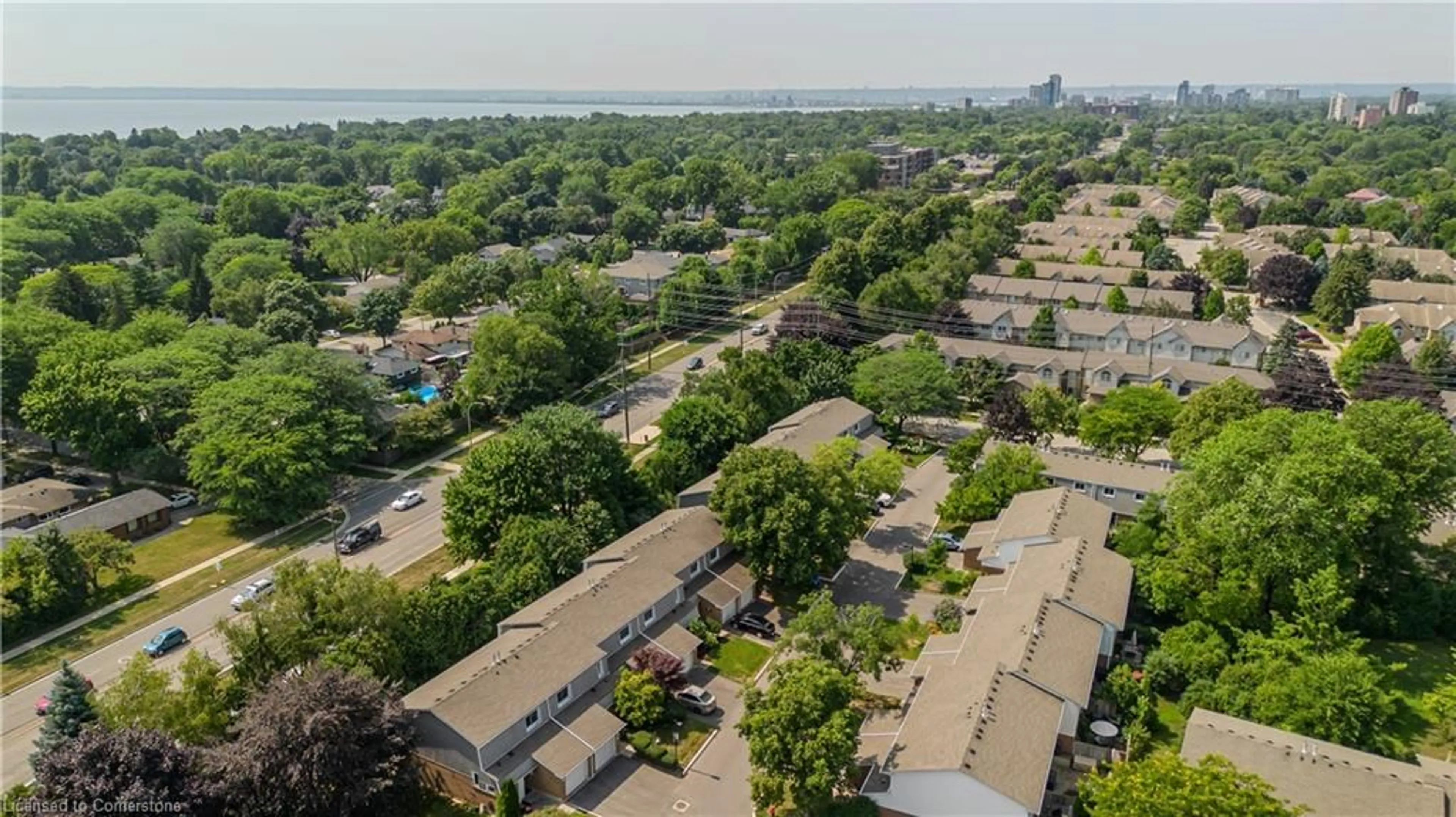 A pic from outside/outdoor area/front of a property/back of a property/a pic from drone, city buildings view from balcony for 447 Woodview Rd #3, Burlington Ontario L7N 2Z9