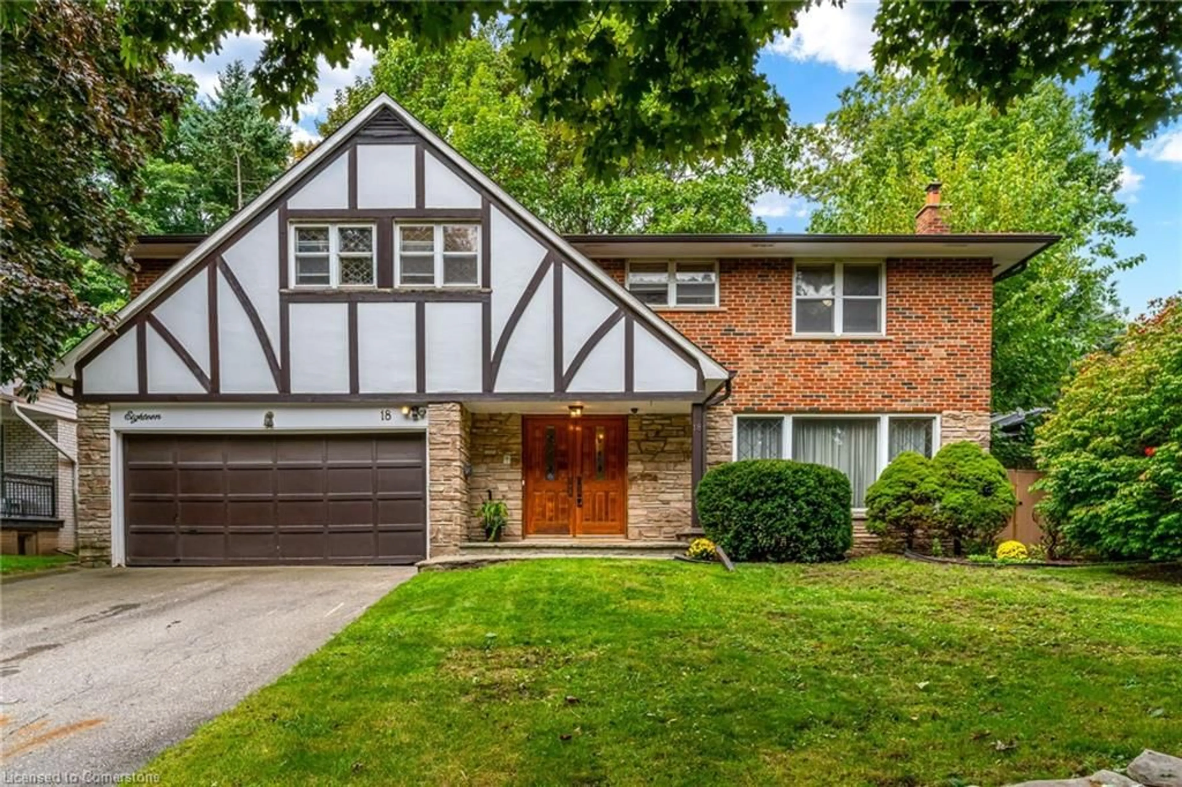 Home with brick exterior material, street for 18 Burnt Log Cres, Toronto Ontario M9C 2J8