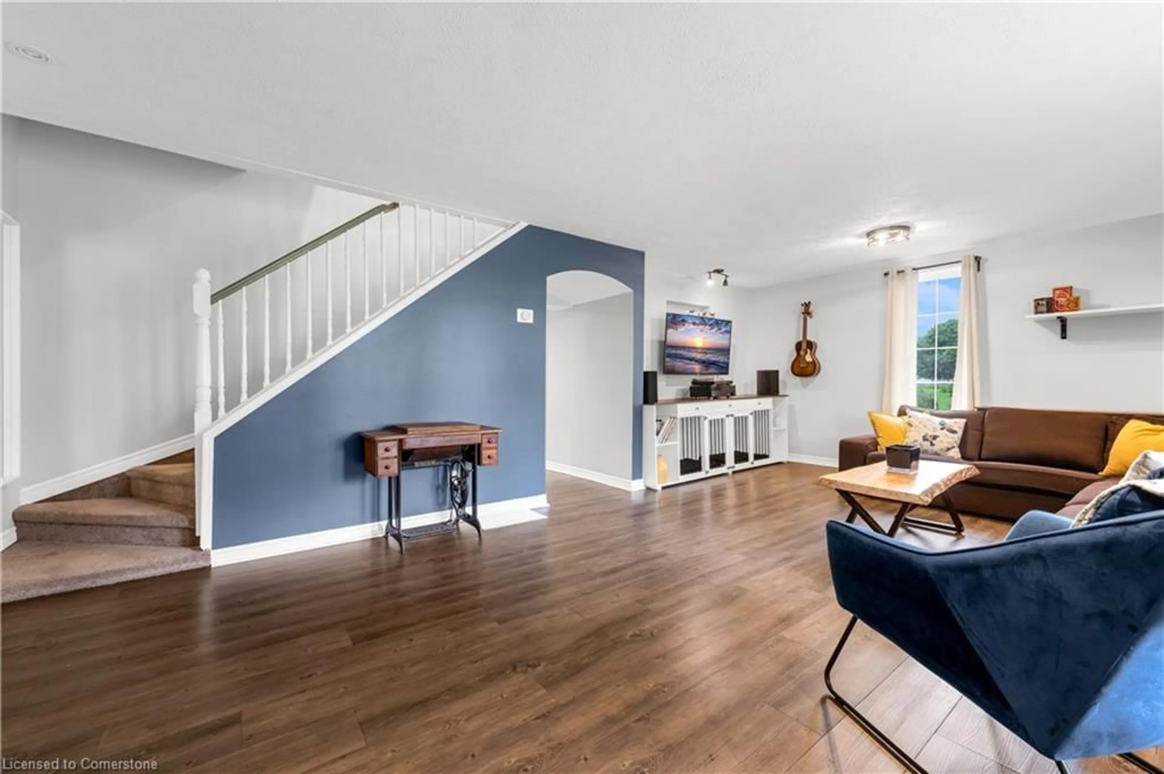 Living room with furniture, wood/laminate floor for 1213 Robinson Rd, Dunnville Ontario N1A 2W1