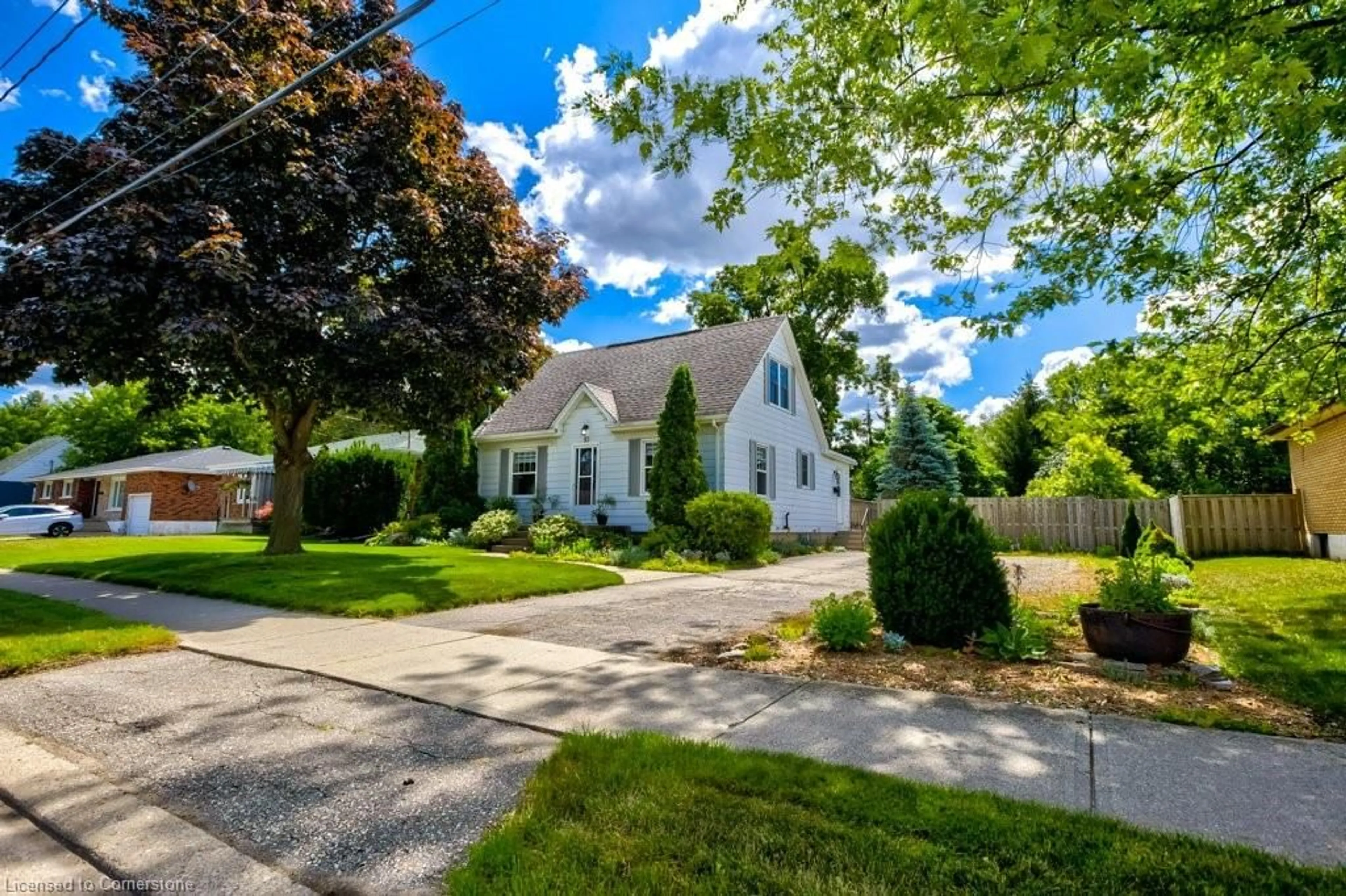 Home with vinyl exterior material, street for 10 Dunsdon St, Brantford Ontario N3R 3J3