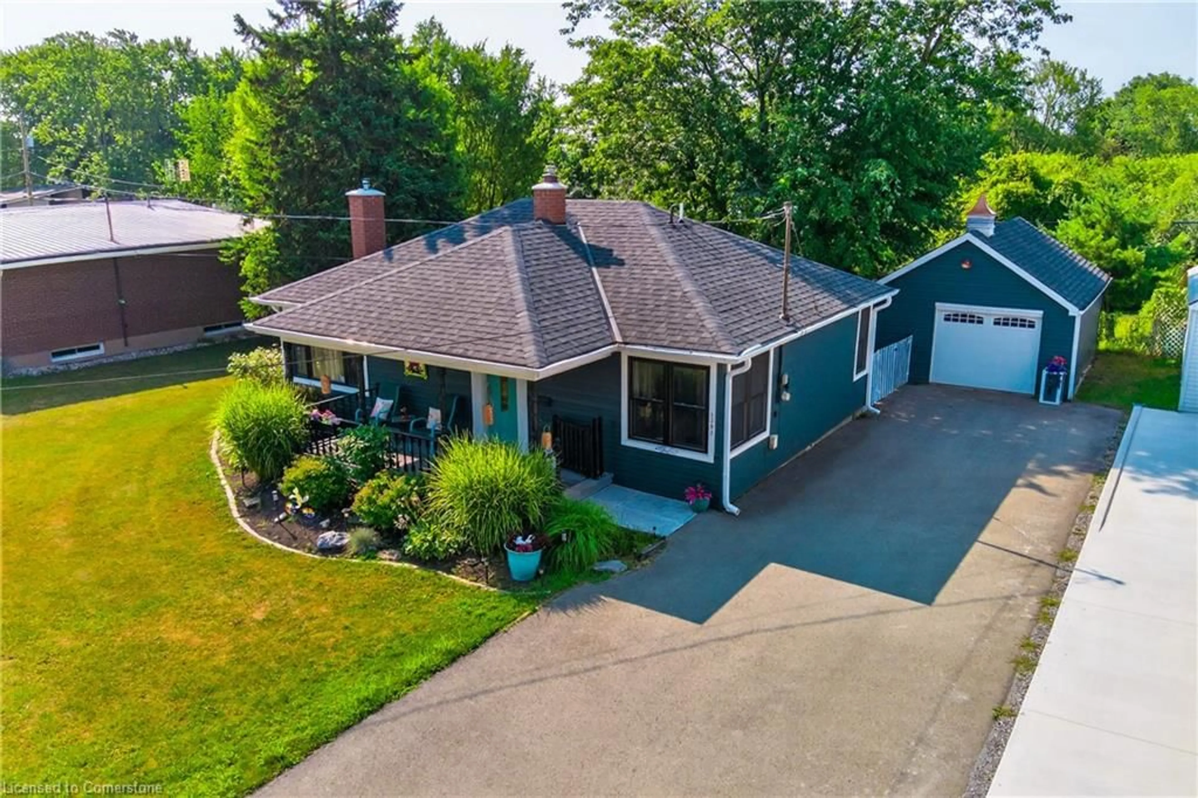 A pic from outside/outdoor area/front of a property/back of a property/a pic from drone, street for 1353 Orchard Ave, Fort Erie Ontario L2A 3E5