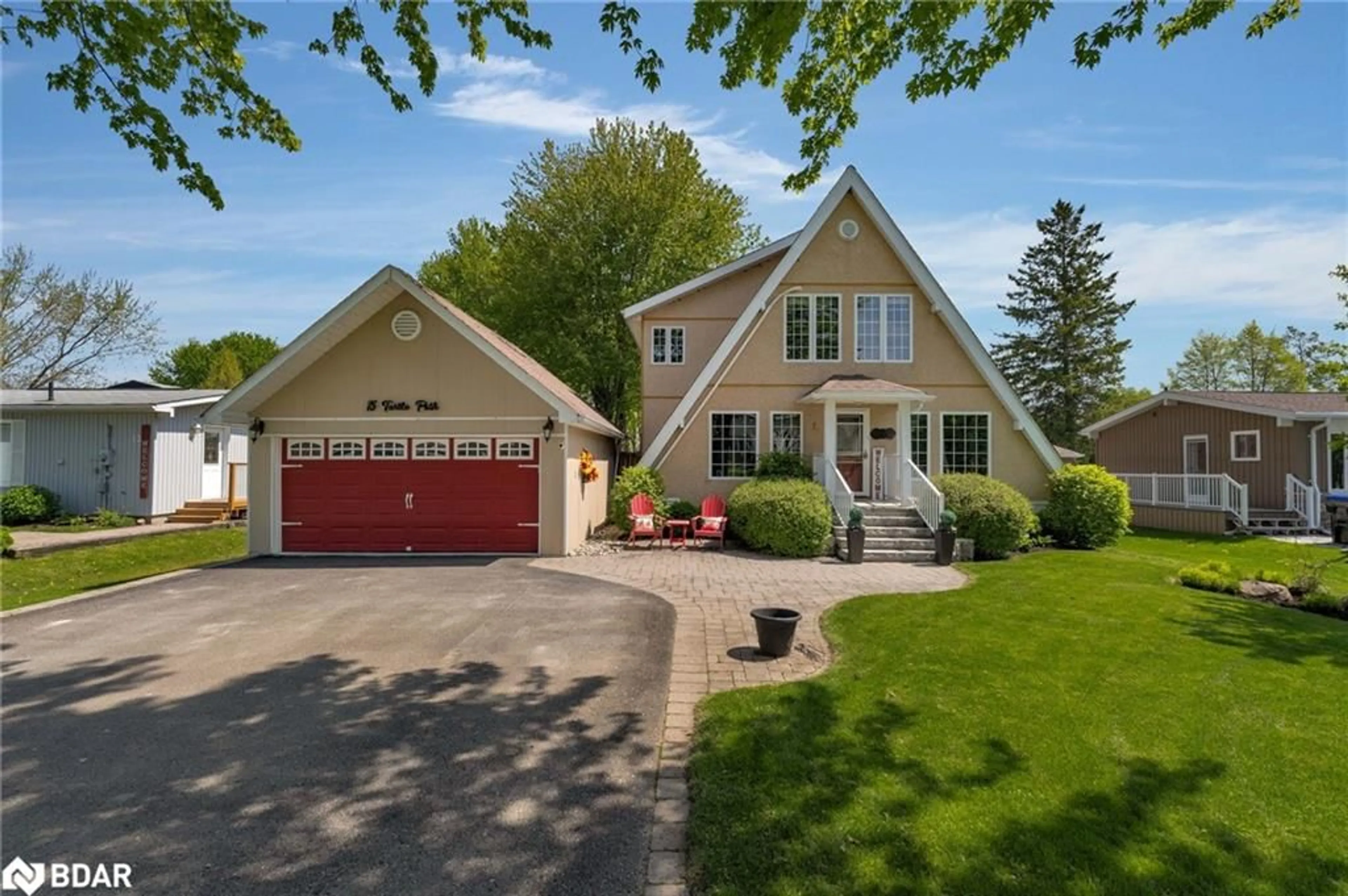 Home with vinyl exterior material, street for 15 Turtle Path, Ramara Ontario L0K 1B0