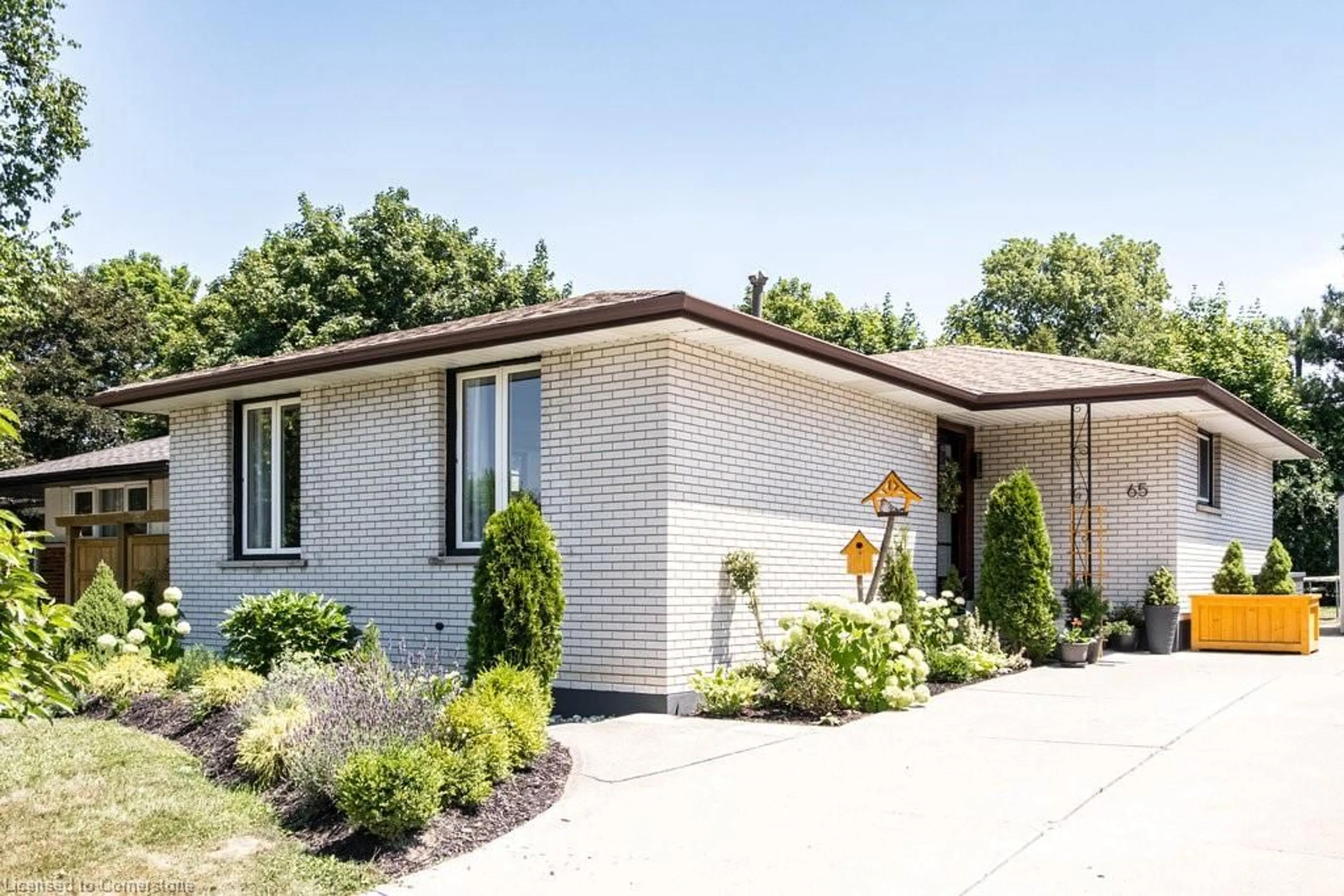 Home with brick exterior material, street for 65 Elgar Ave, Hamilton Ontario L8P 3T8