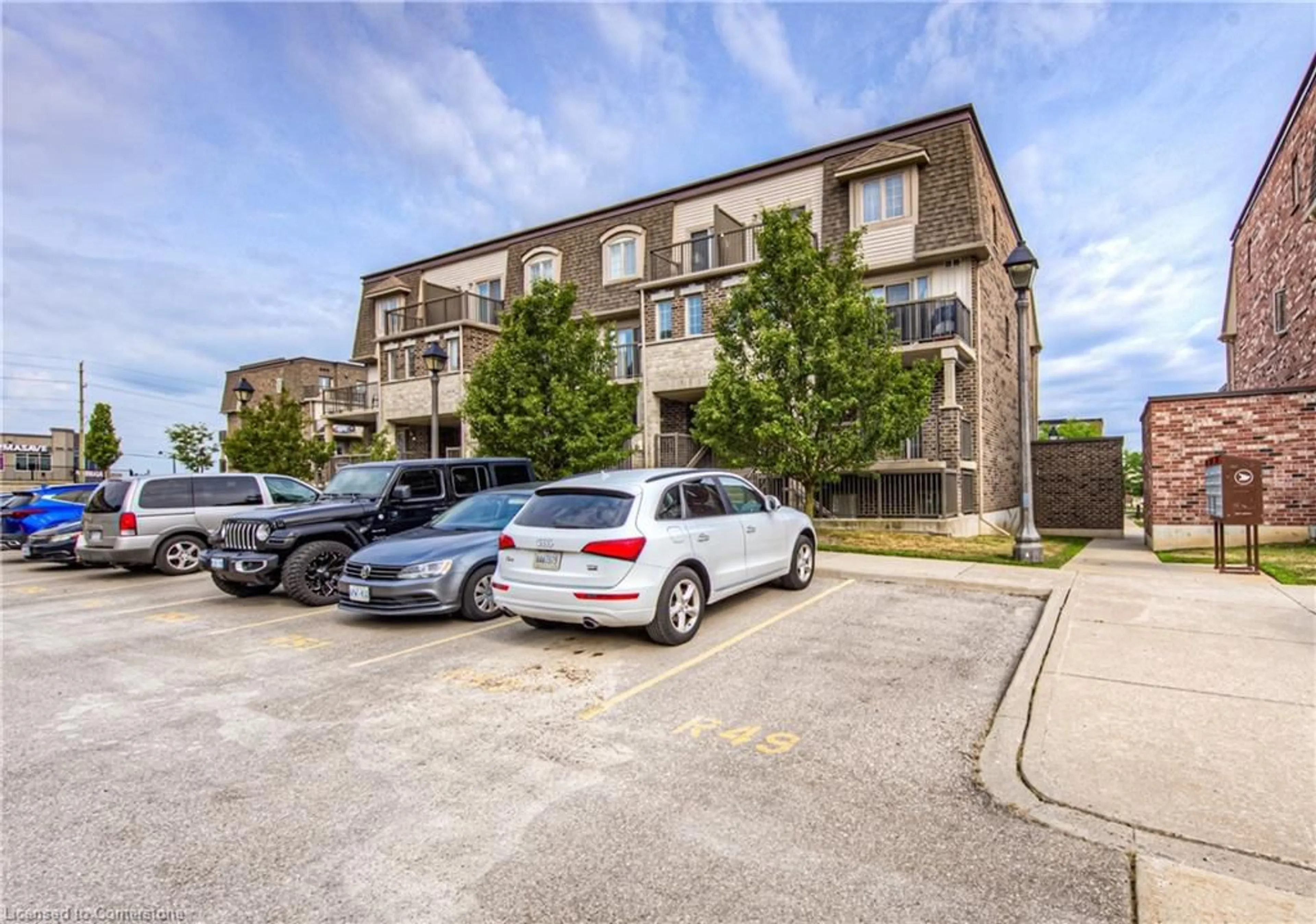 A pic from outside/outdoor area/front of a property/back of a property/a pic from drone, street for 240 Rachel Cres #F, Kitchener Ontario N2R 0E1