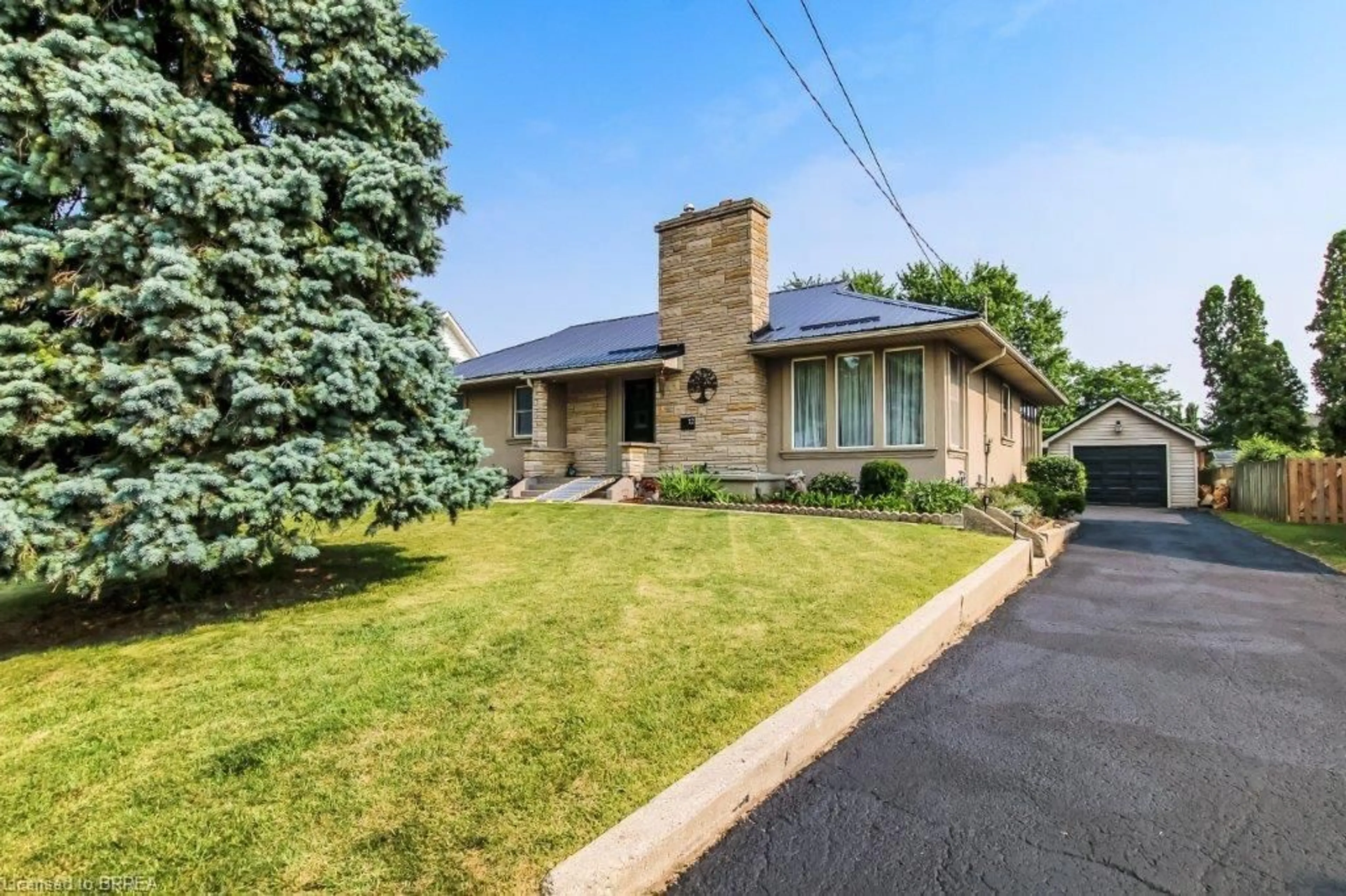 Home with brick exterior material, street for 12 Parkview Rd, Hagersville Ontario N0A 1H0