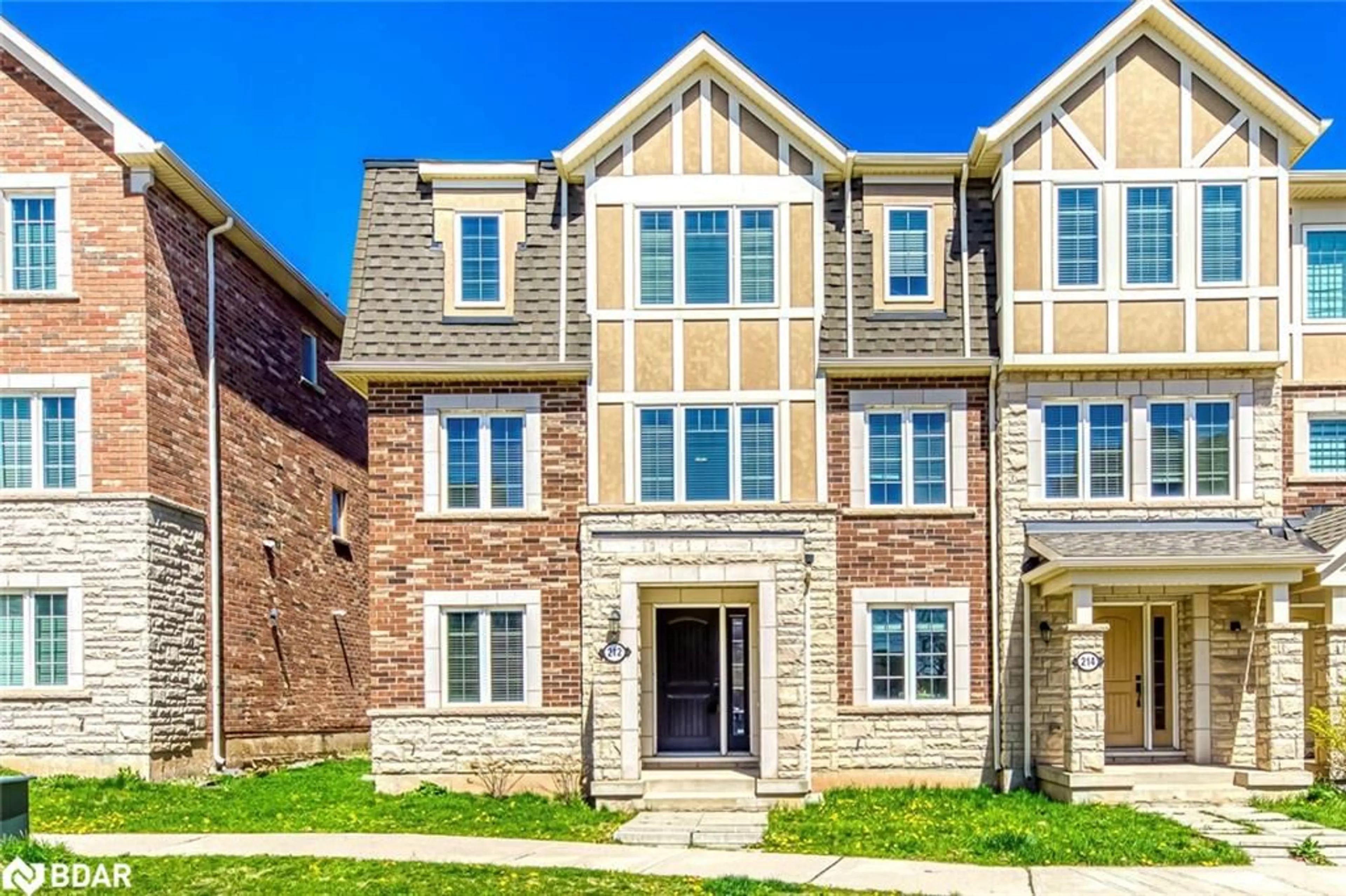 Home with brick exterior material, street for 212 Ellen Davidson Dr, Oakville Ontario L6M 0V1