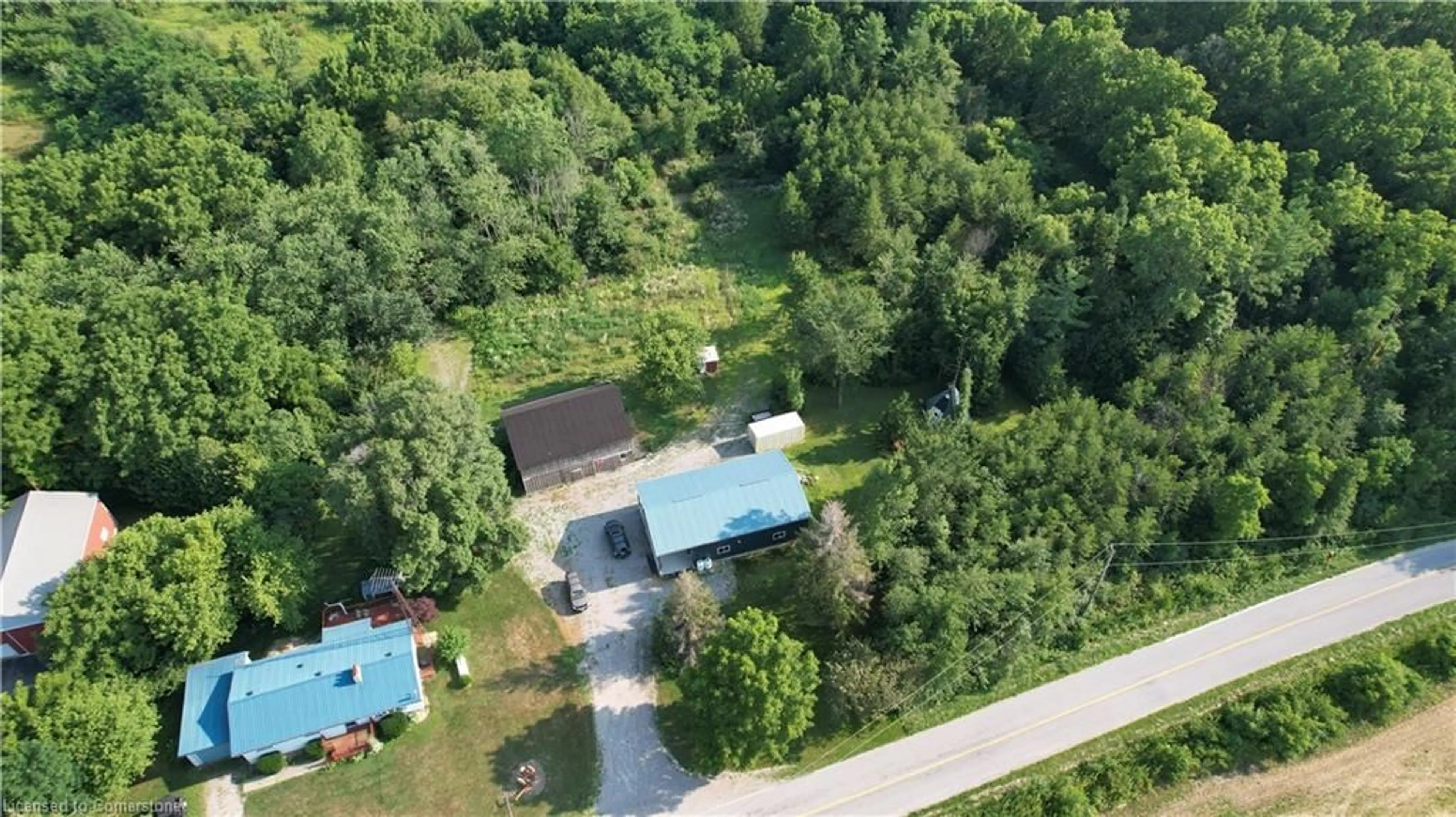 A pic from outside/outdoor area/front of a property/back of a property/a pic from drone, forest/trees view for 58 Conc 6 Conc, Jarvis Ontario N0A 1J0