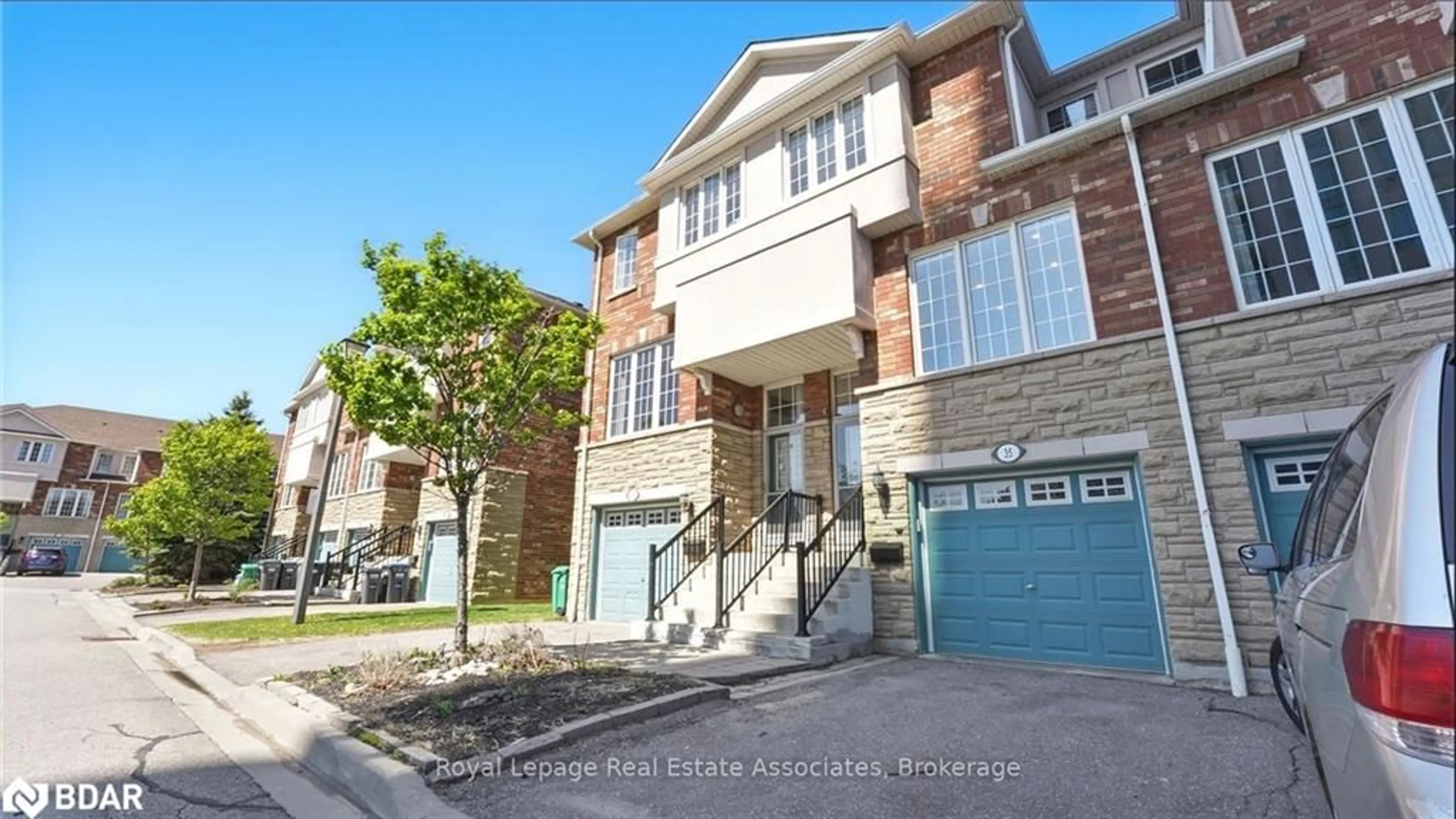 Home with brick exterior material, street for 1355 Rathburn Rd #35, Mississauga Ontario L4W 5R5
