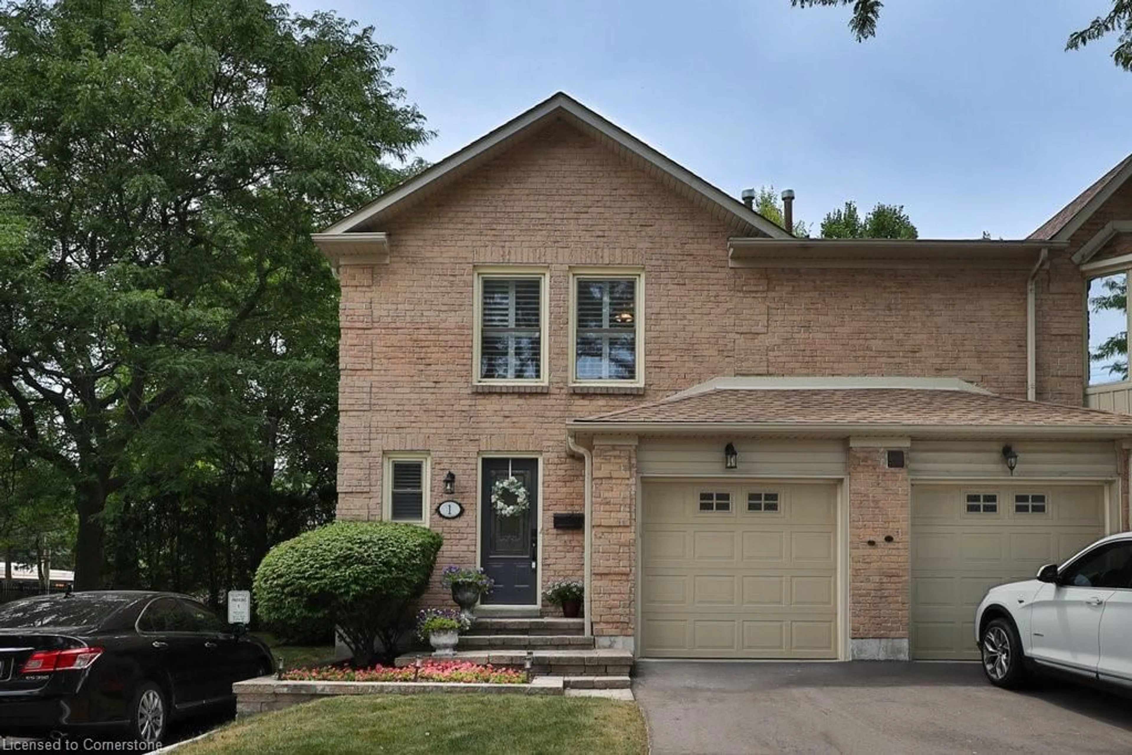 Home with brick exterior material, street for 5411 Lakeshore Rd #1, Burlington Ontario L7L 1E1