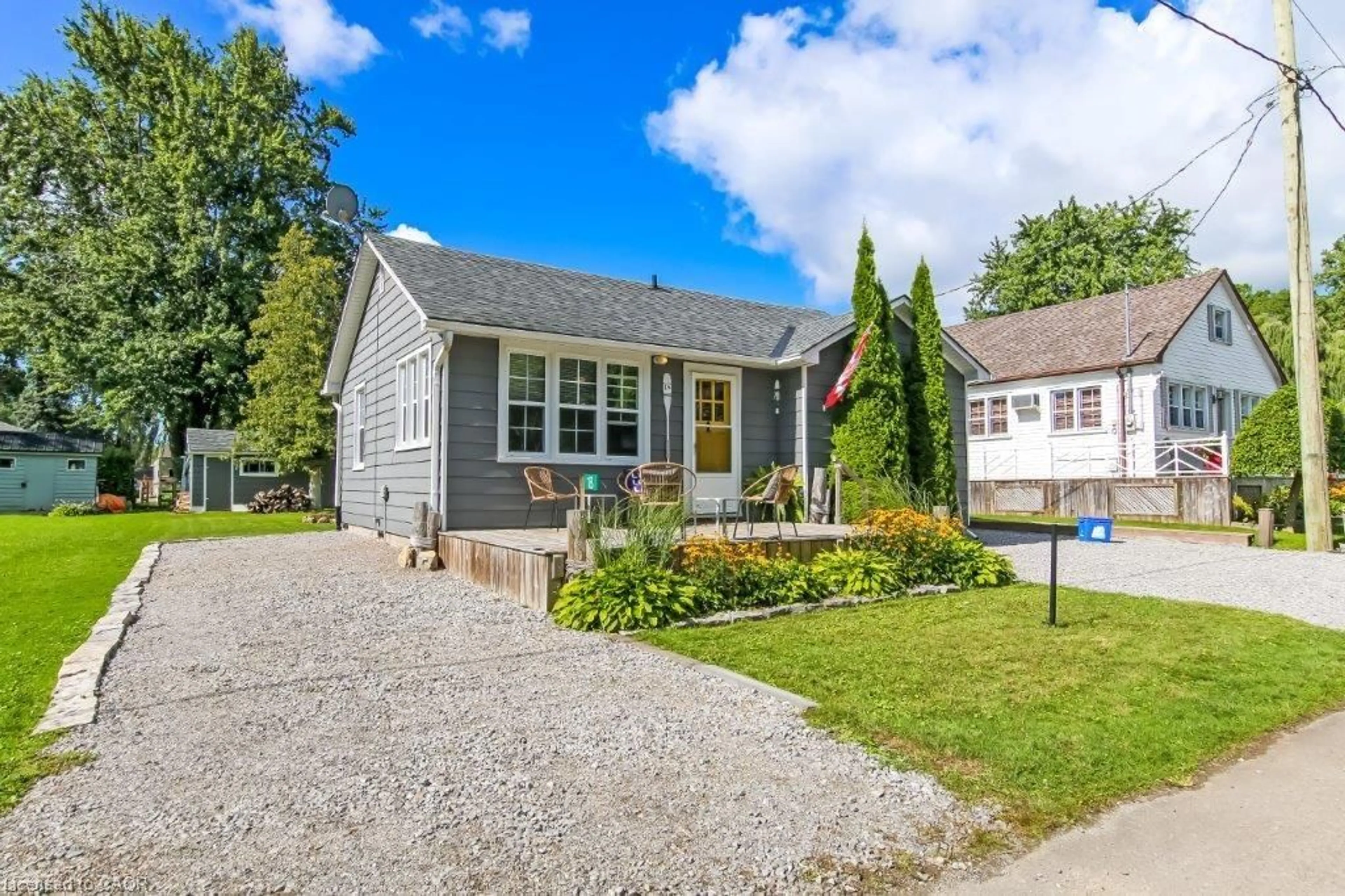 Home with vinyl exterior material, street for 18 Isabel St, Turkey Point Ontario N0E 1T0