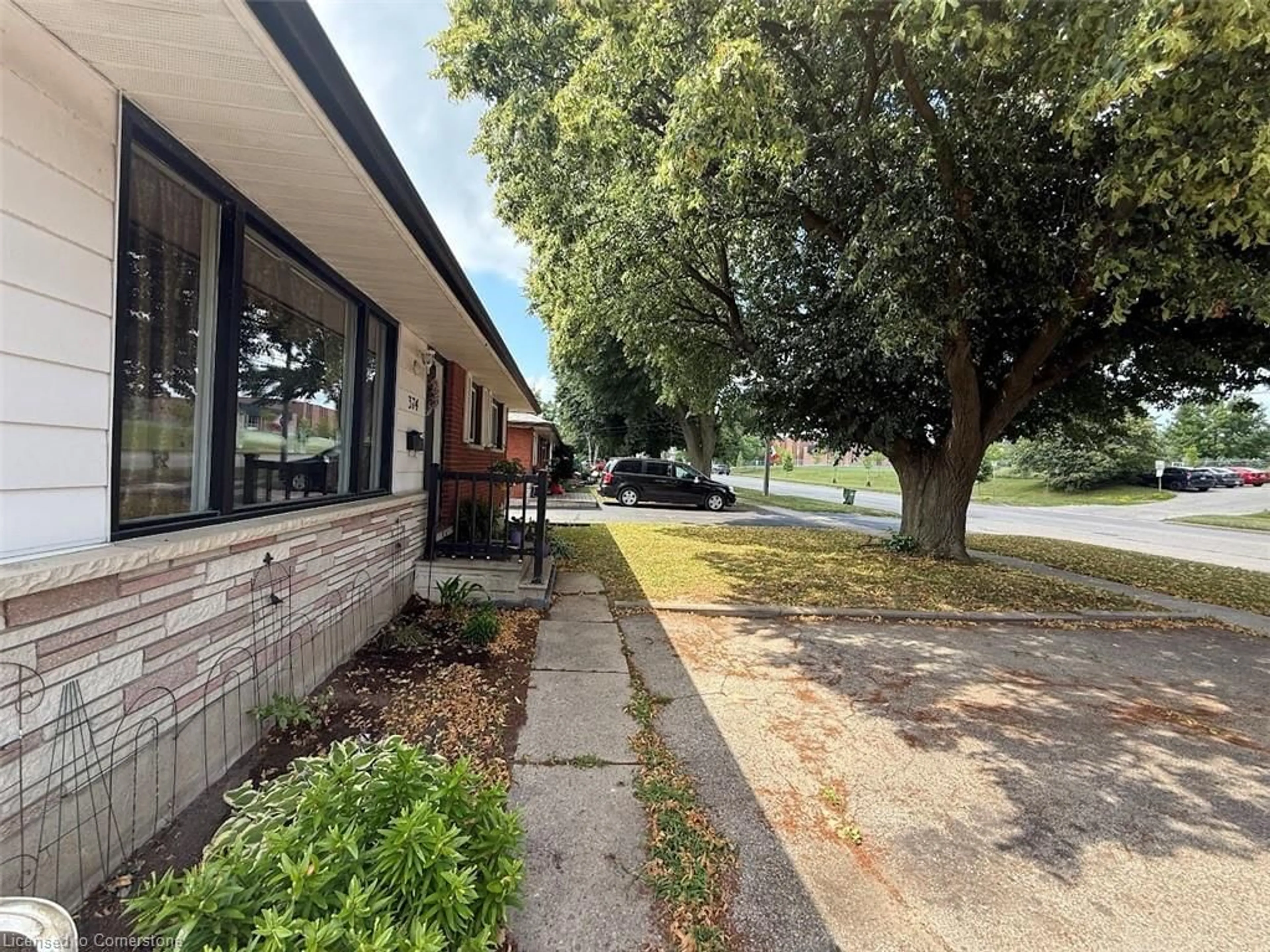 A pic from outside/outdoor area/front of a property/back of a property/a pic from drone, street for 374 Victoria Rd, Guelph Ontario N1E 5J7