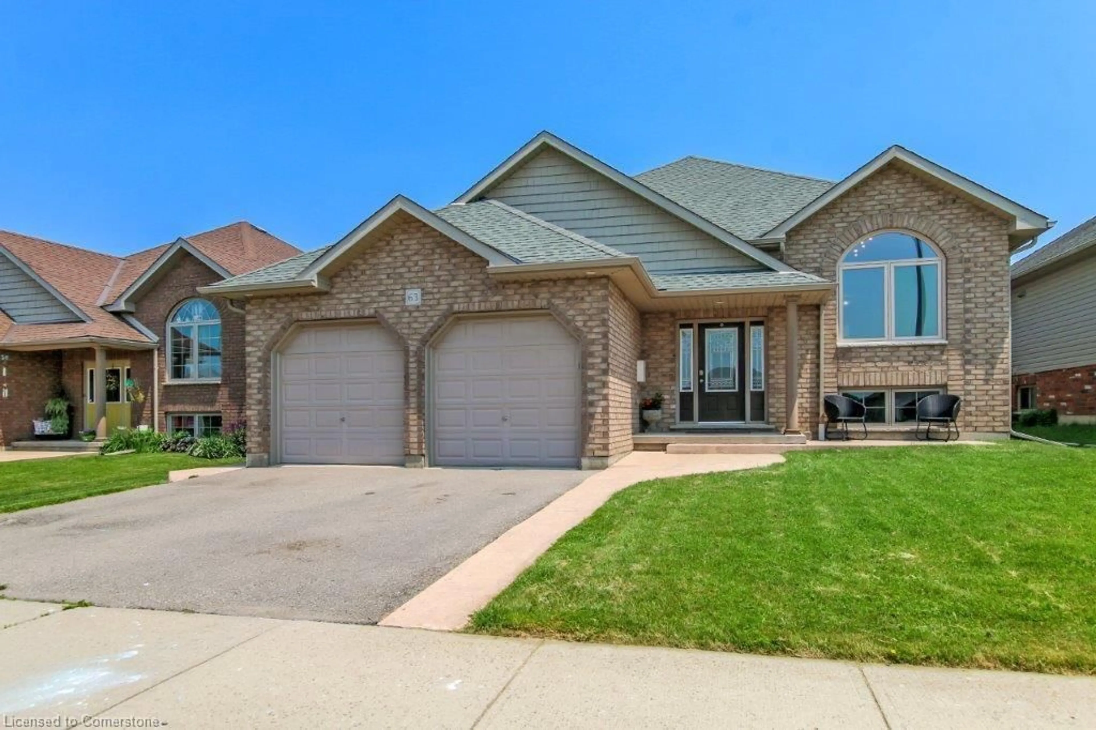 Home with brick exterior material, street for 63 Redbud Cres, Simcoe Ontario N3Y 0B8