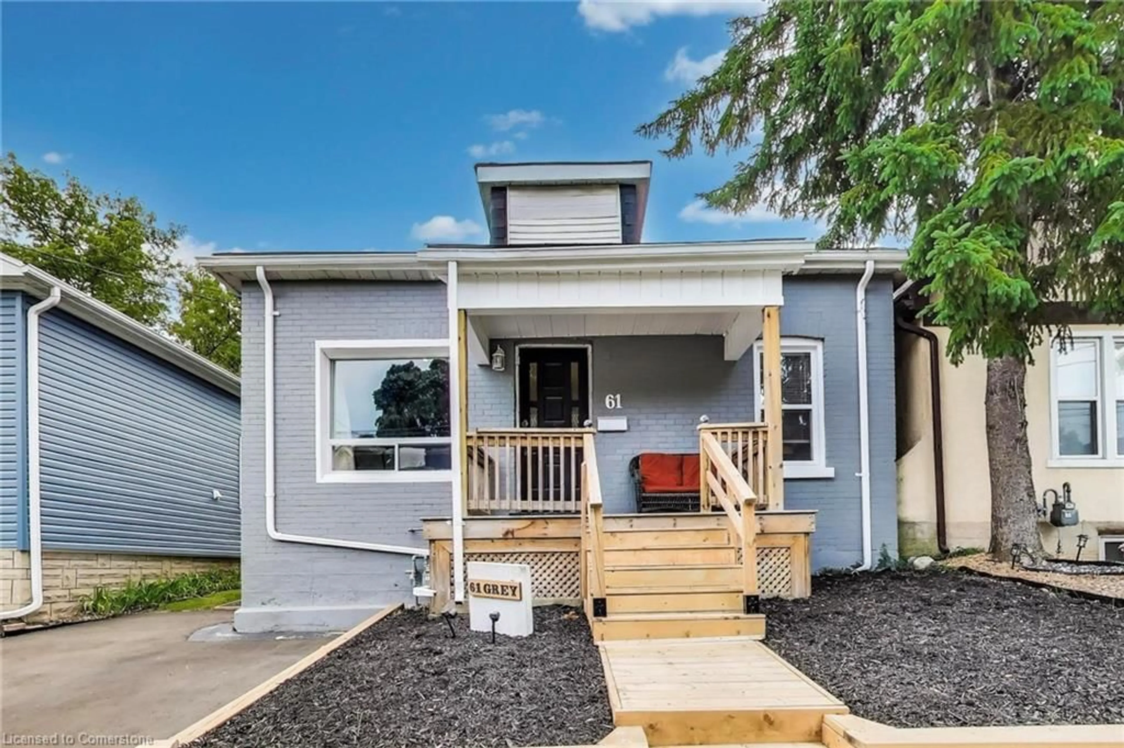 Home with vinyl exterior material, street for 61 Grey St, Brantford Ontario N3T 2T3