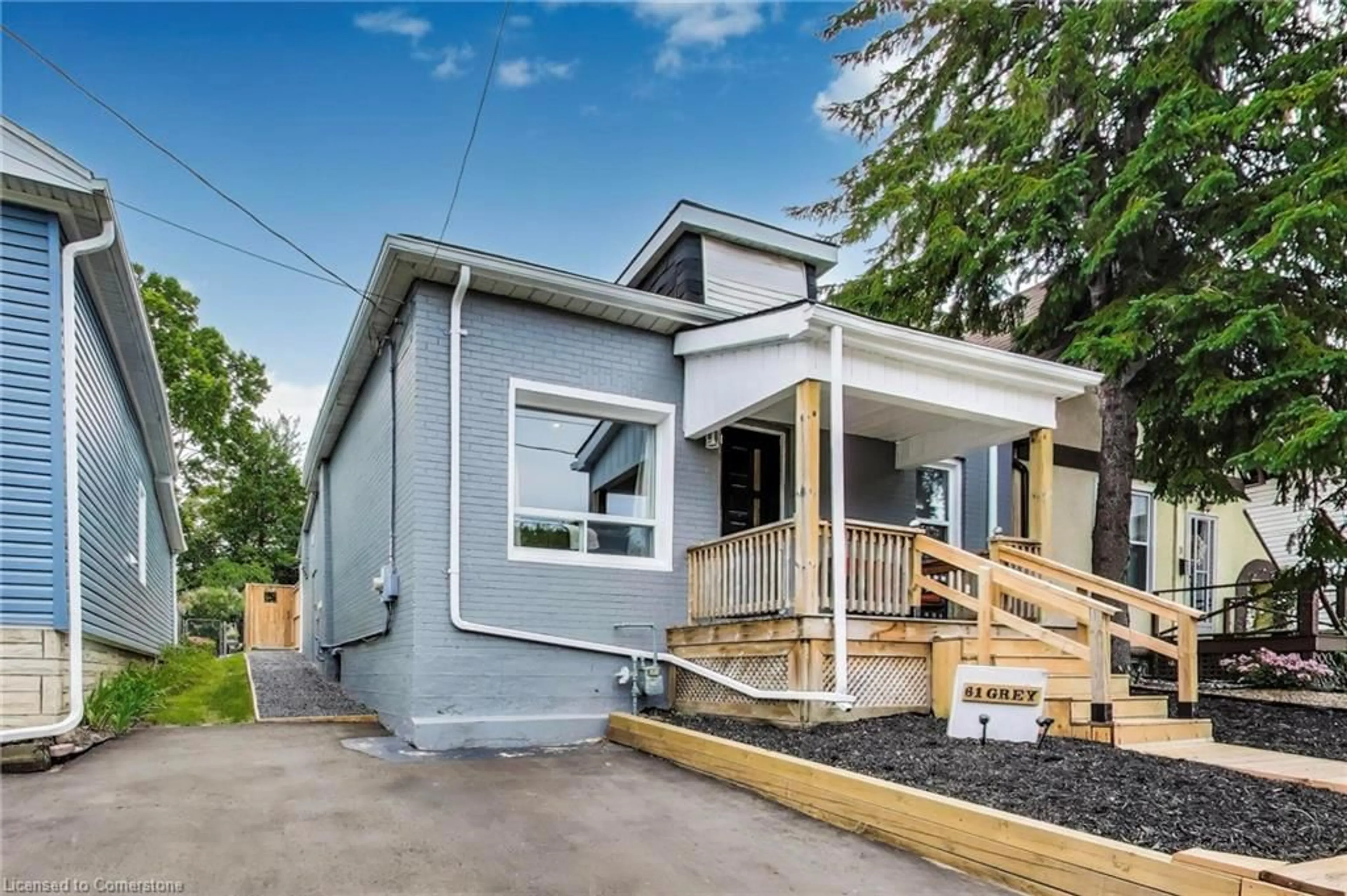 Home with vinyl exterior material, street for 61 Grey St, Brantford Ontario N3T 2T3