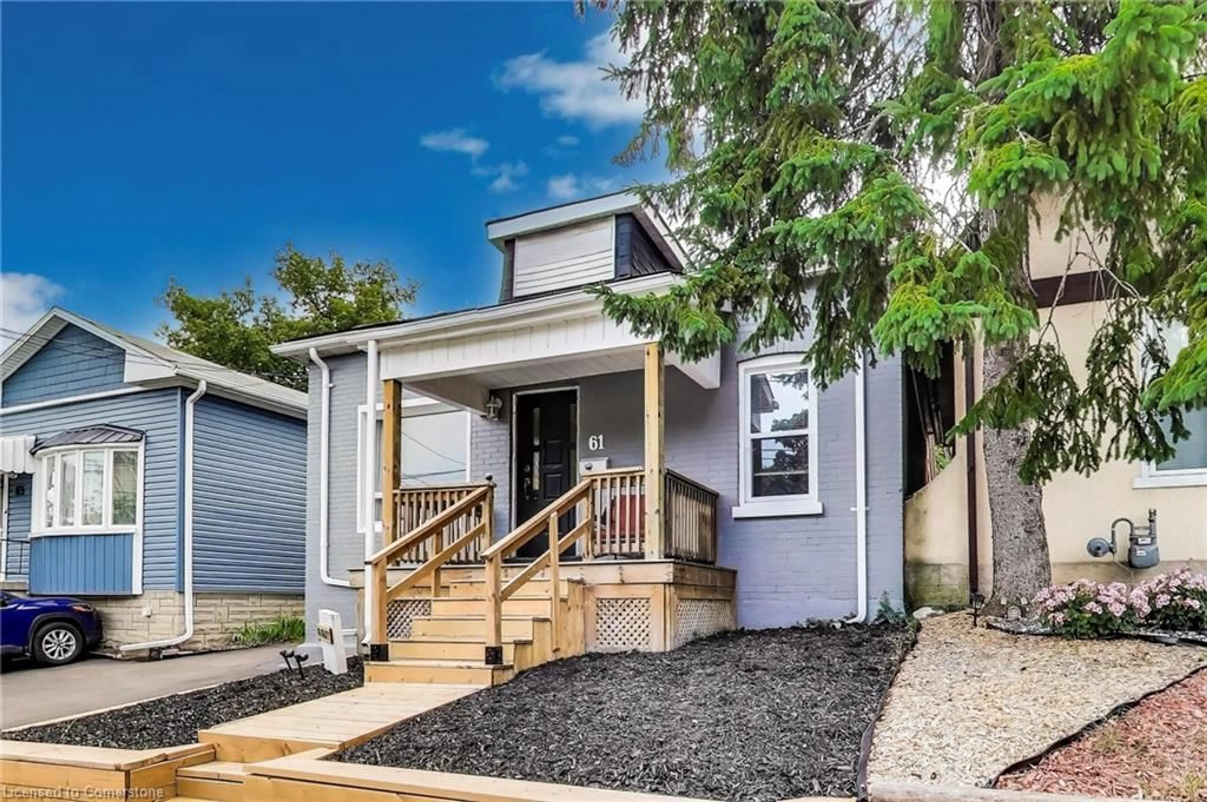 Home with vinyl exterior material, street for 61 Grey St, Brantford Ontario N3T 2T3