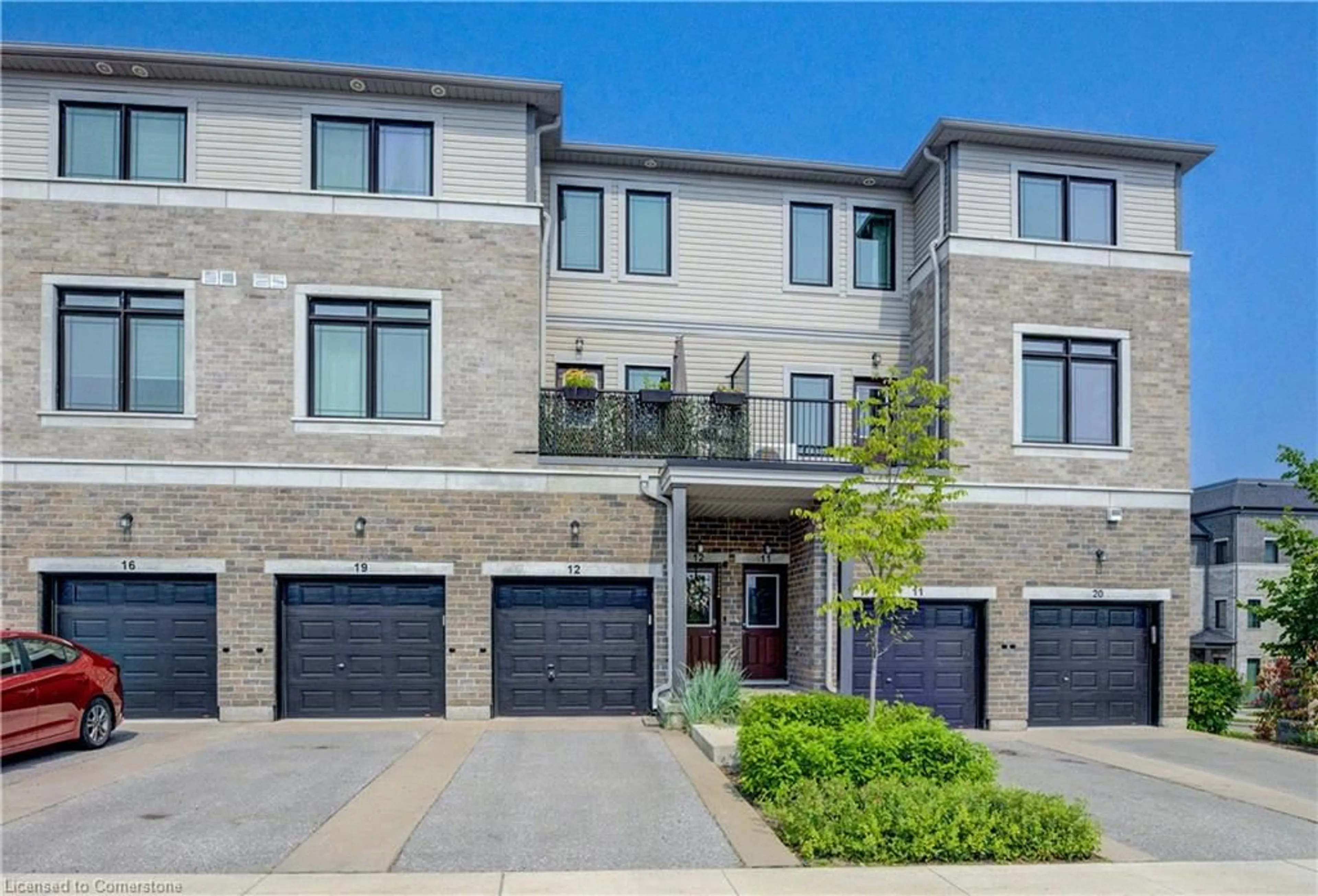Home with brick exterior material, street for 107 Westra Dr #12, Guelph Ontario N1K 0A5