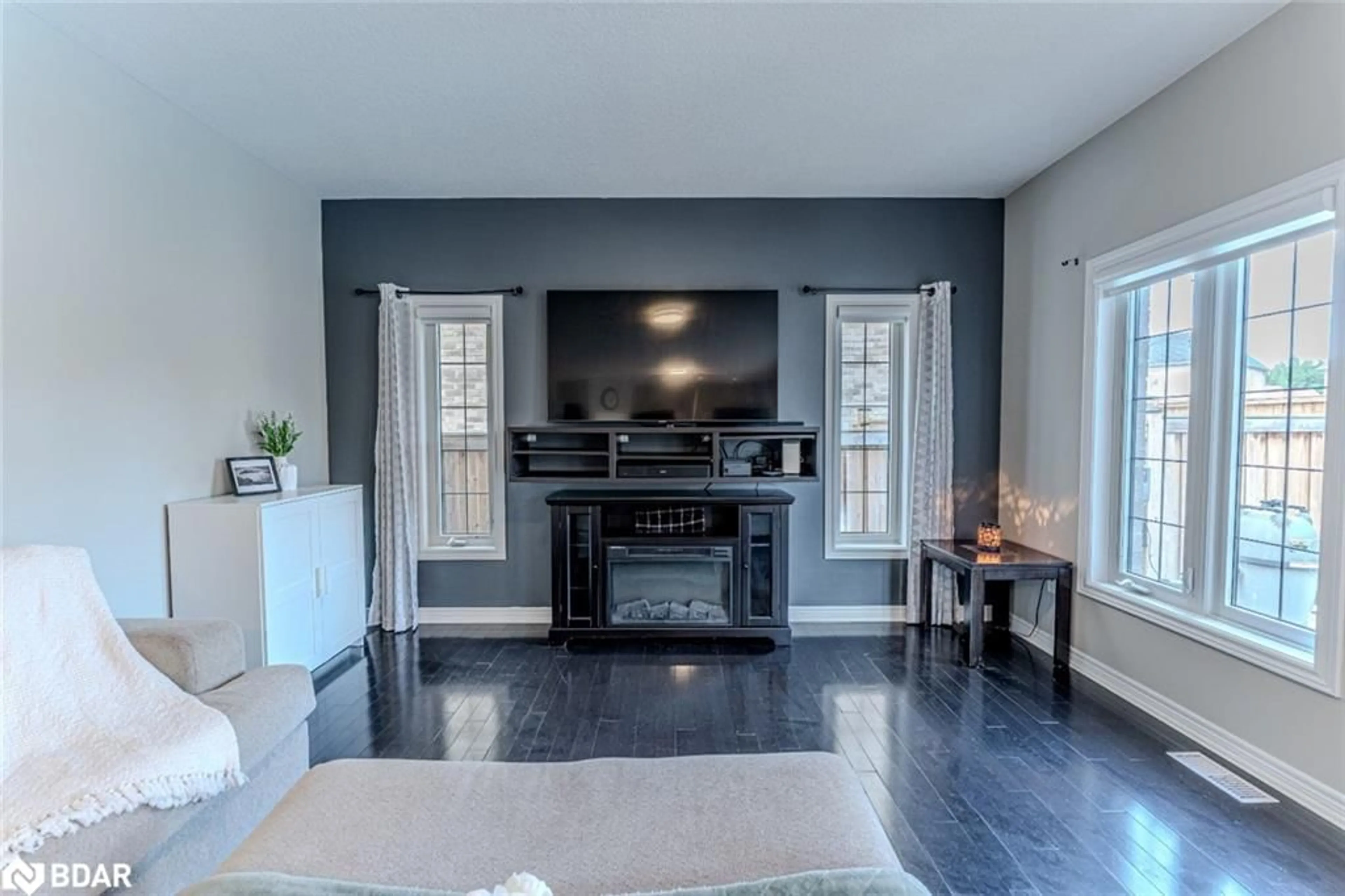 Living room with furniture, unknown for 14 Arnold Cres, Angus Ontario L3W 0P9