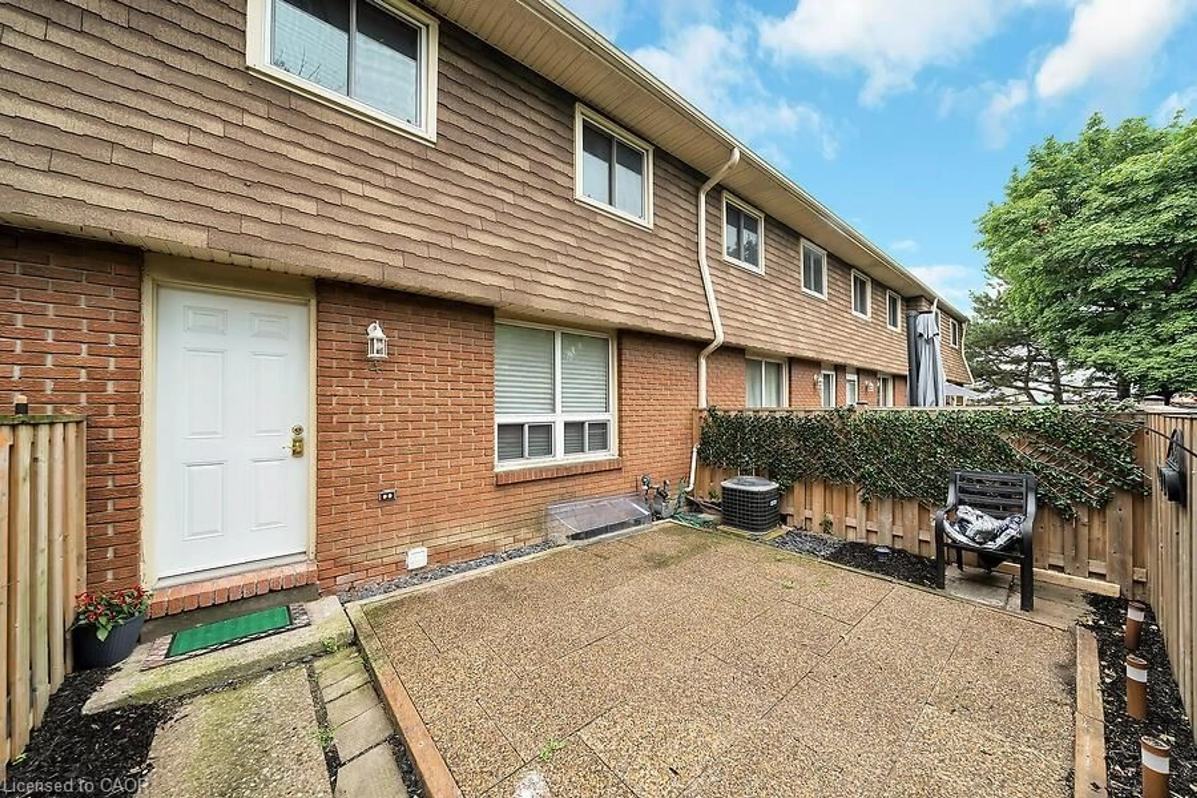 A pic from outside/outdoor area/front of a property/back of a property/a pic from drone, street for 1015 Upper Gage Ave #4, Hamilton Ontario L8V 4L2
