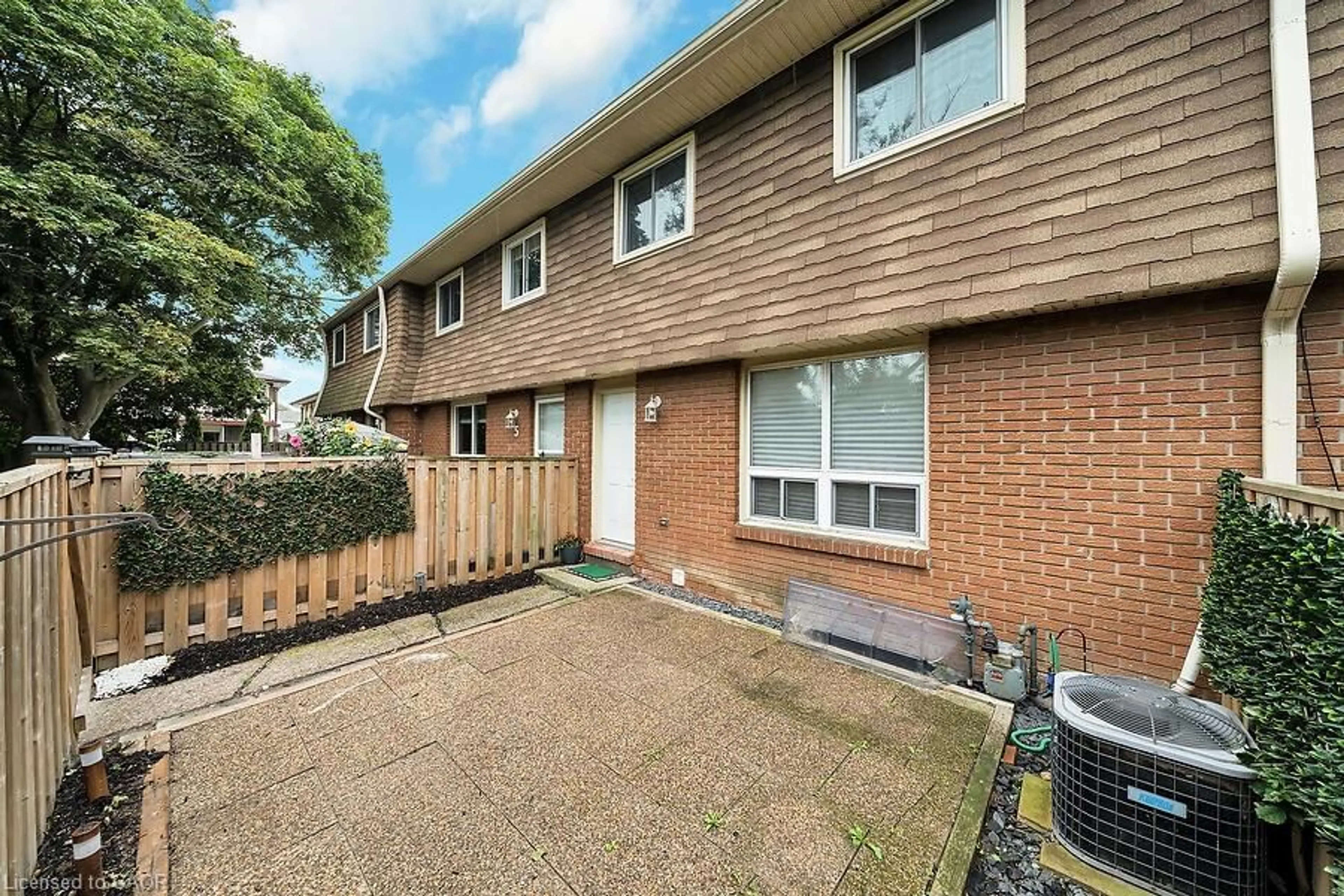 A pic from outside/outdoor area/front of a property/back of a property/a pic from drone, street for 1015 Upper Gage Ave #4, Hamilton Ontario L8V 4L2