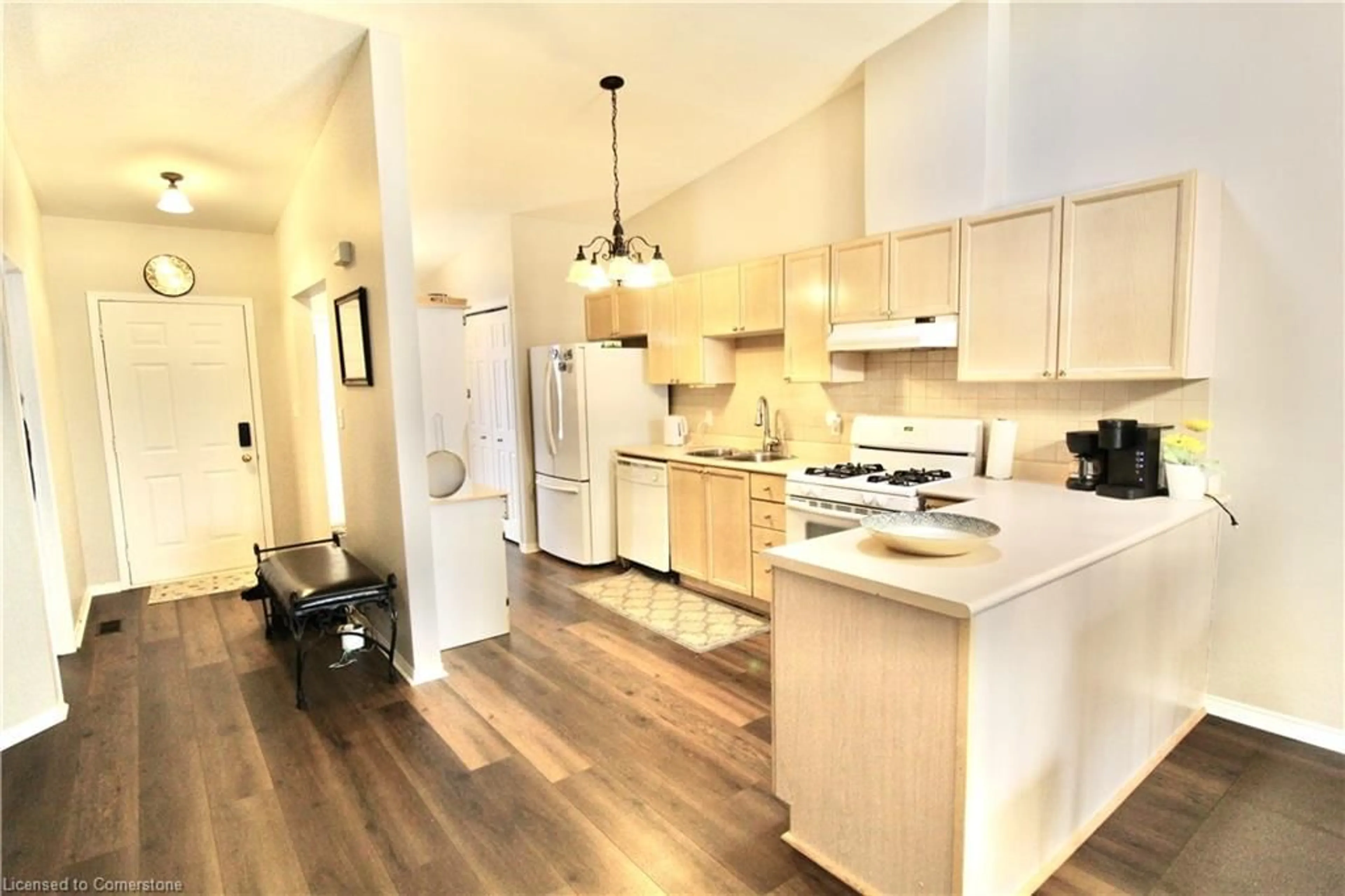 Open concept kitchen, wood/laminate floor for 4451 Michael Ave, Beamsville Ontario L3J 0E2