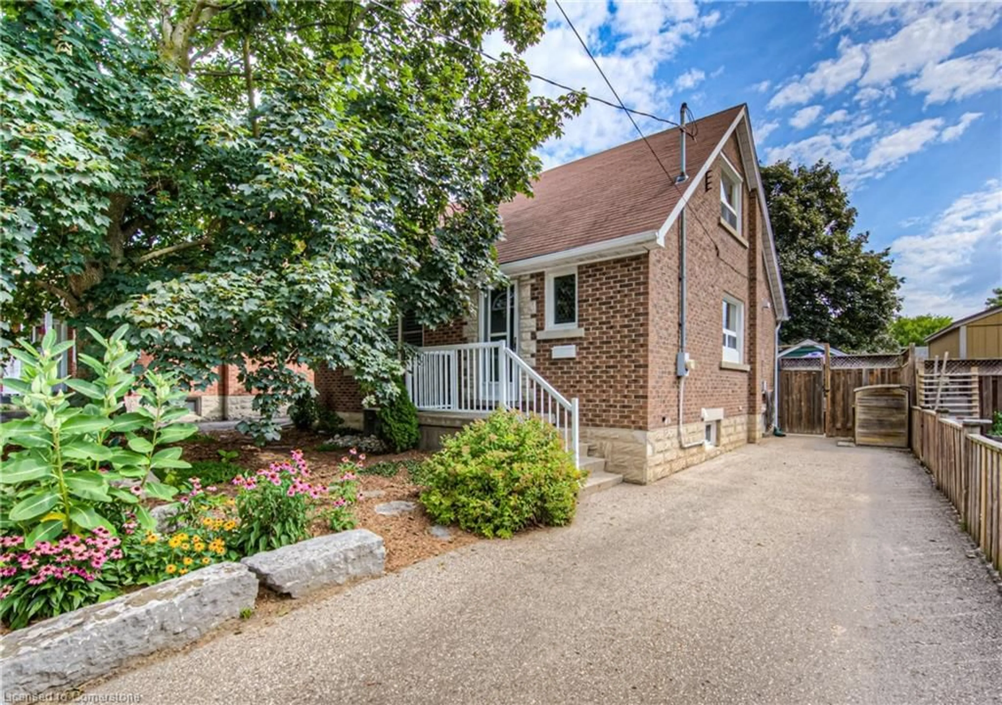 Home with brick exterior material, street for 32 Ellis Ave, Kitchener Ontario N2H 4G7