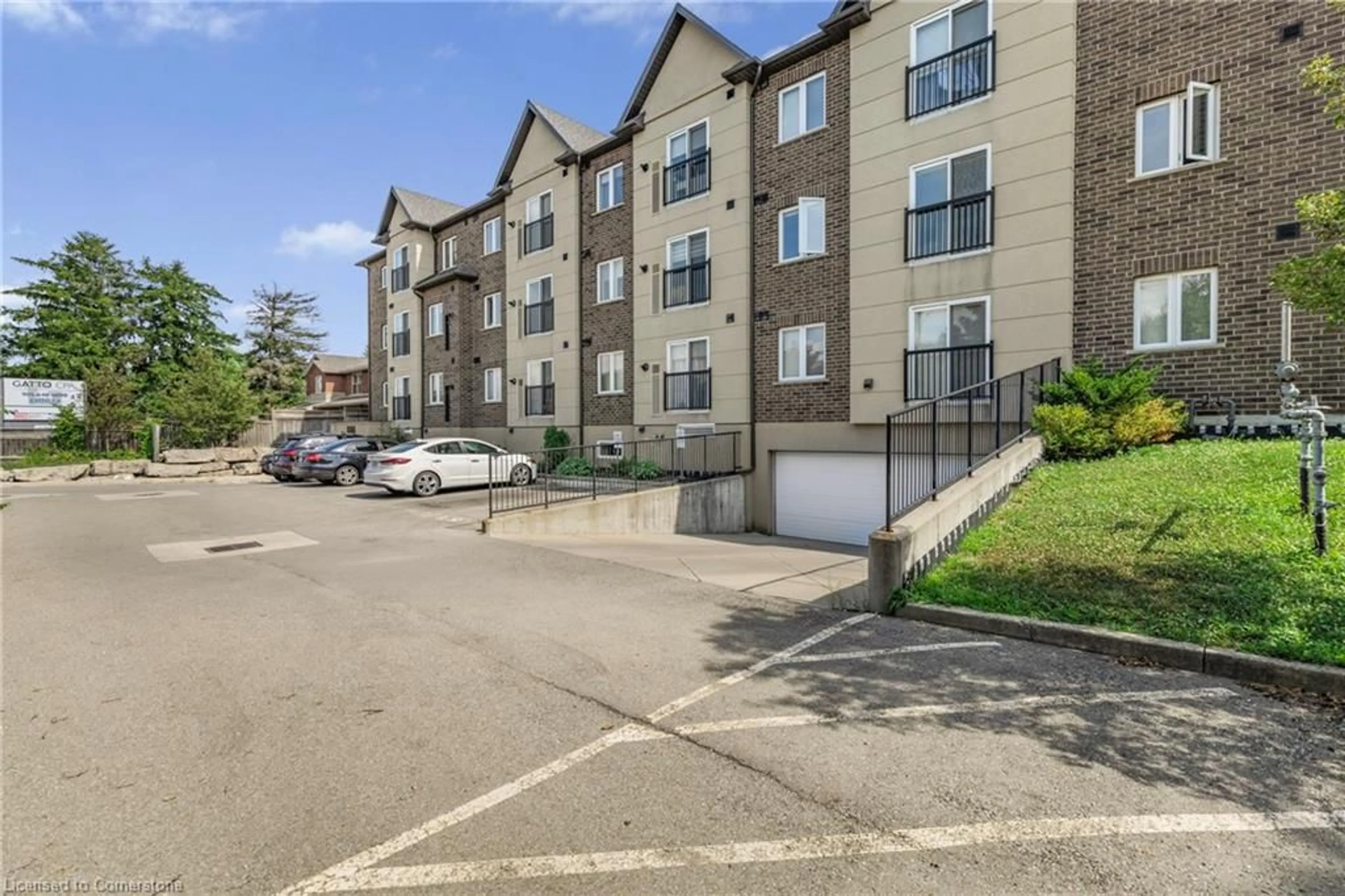 A pic from outside/outdoor area/front of a property/back of a property/a pic from drone, street for 886 Golf Links Rd #302, Ancaster Ontario L9K 1J8