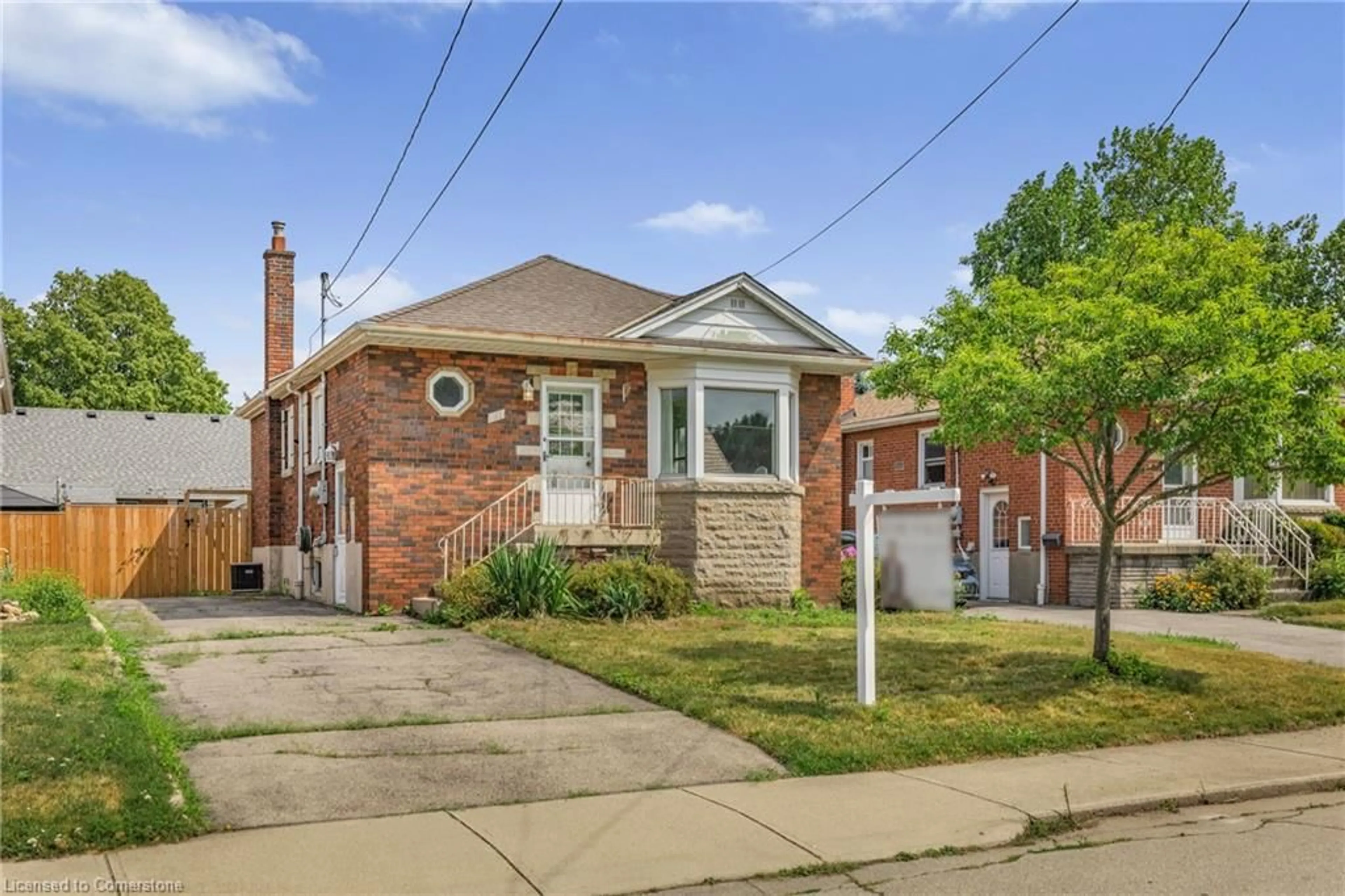 Home with brick exterior material, street for 191 East 32nd St, Hamilton Ontario L8V 3S1