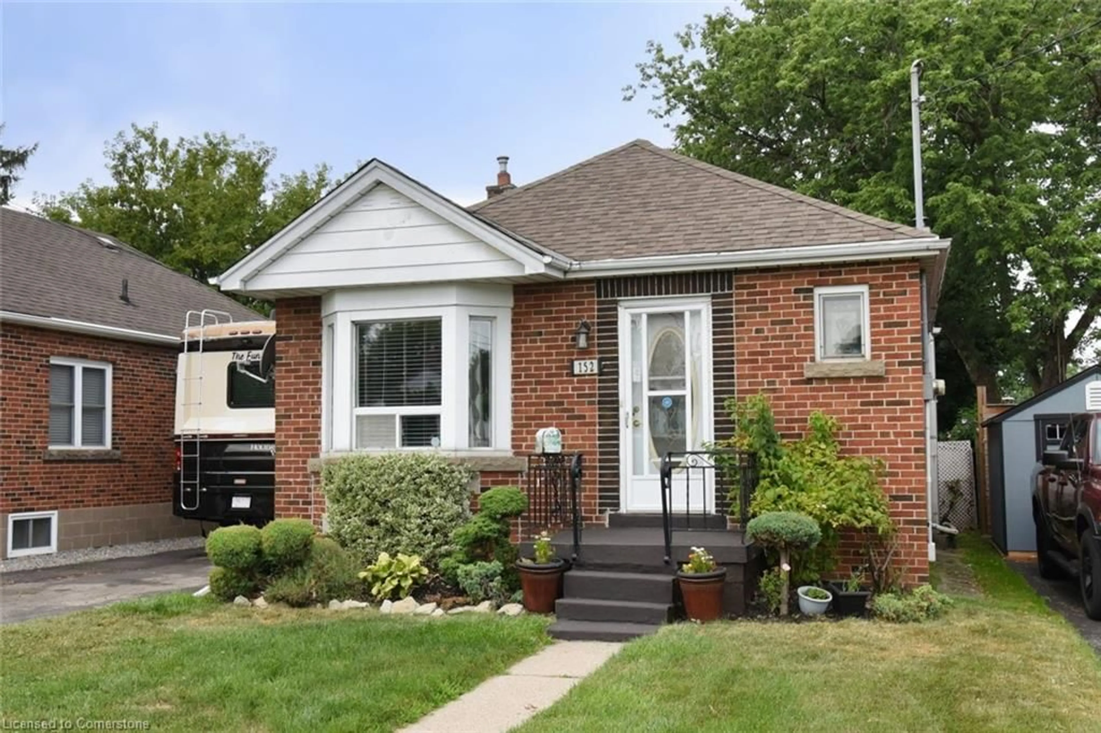 Home with brick exterior material, street for 152 Glencairn Ave, Hamilton Ontario L8K 3N9