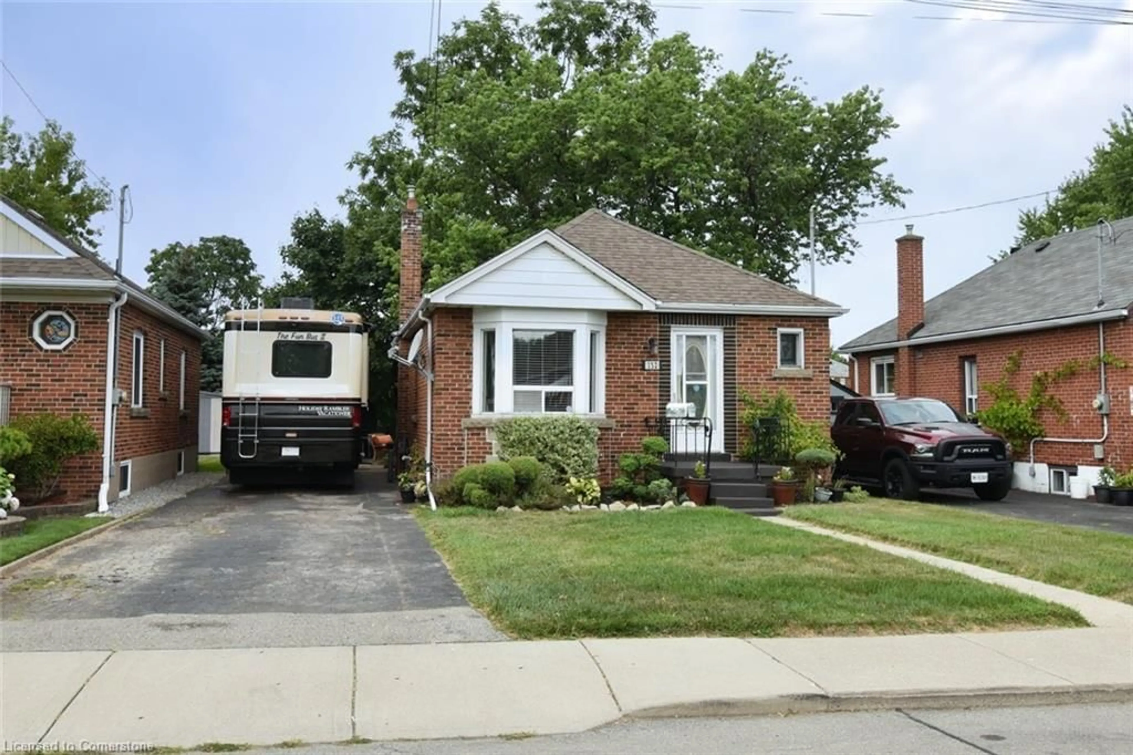 Home with brick exterior material, street for 152 Glencairn Ave, Hamilton Ontario L8K 3N9