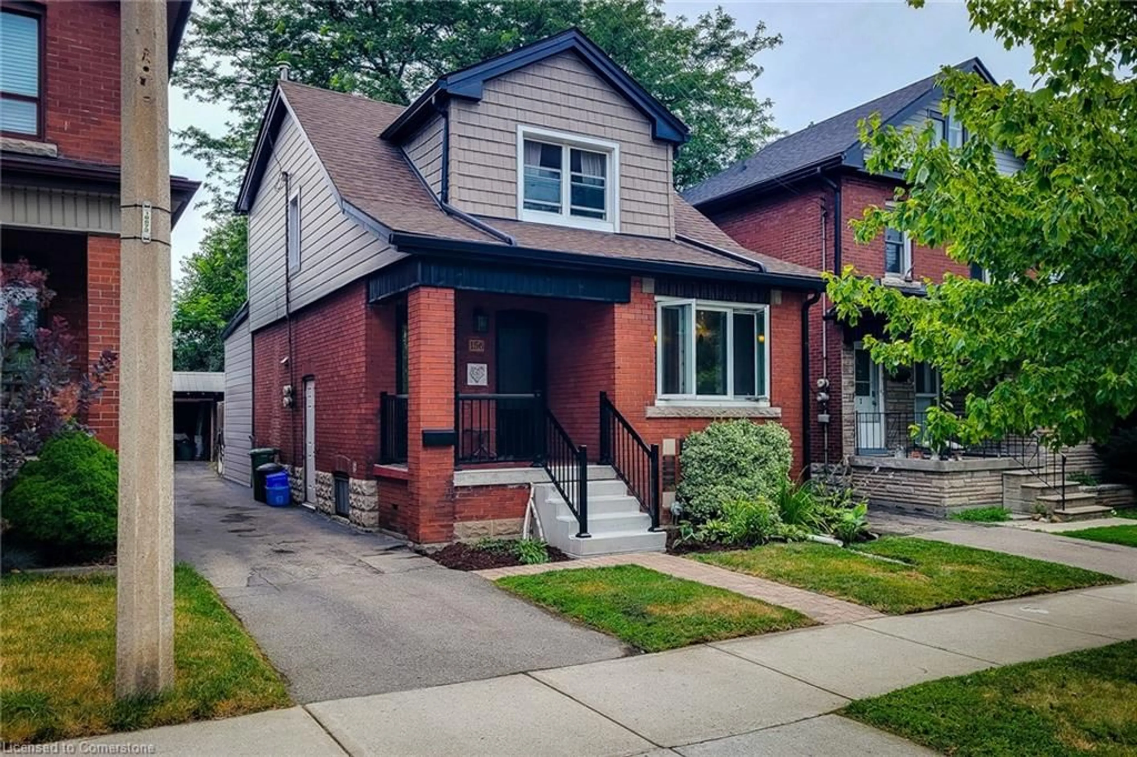 Home with brick exterior material, street for 156 Park Row, Hamilton Ontario L8K 2J8