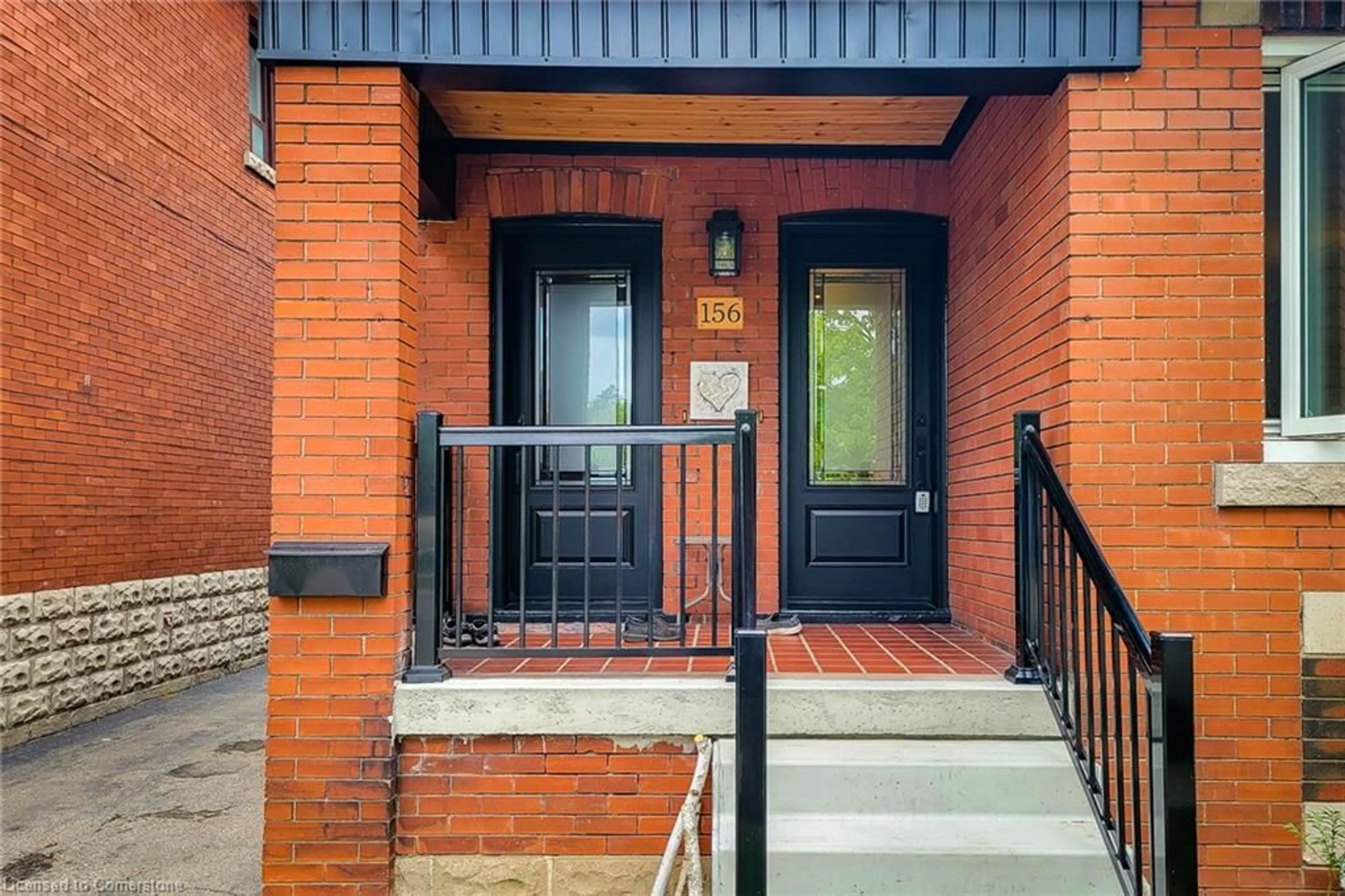 Home with brick exterior material, street for 156 Park Row, Hamilton Ontario L8K 2J8