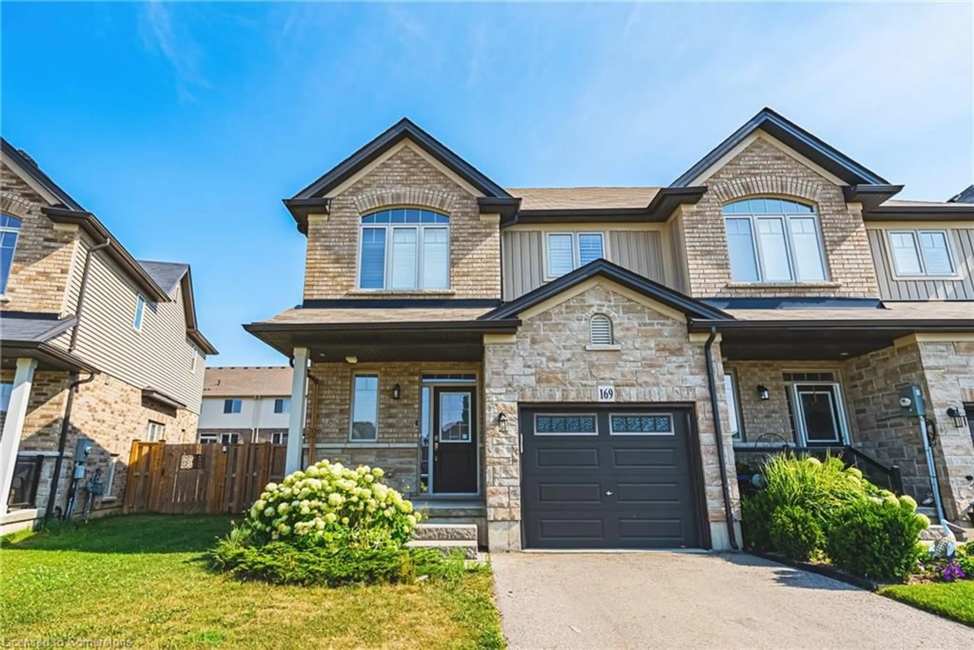 Home with brick exterior material, street for 169 Fall Fair Way, Binbrook Ontario L0R 1C0