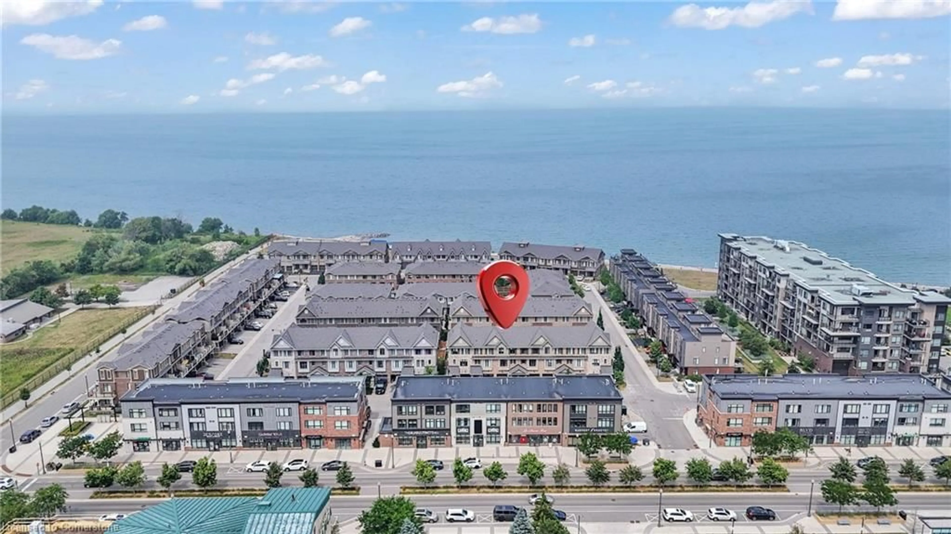 A pic from outside/outdoor area/front of a property/back of a property/a pic from drone, water/lake/river/ocean view for 68 Esplanade Lane, Grimsby Ontario L3M 0H2