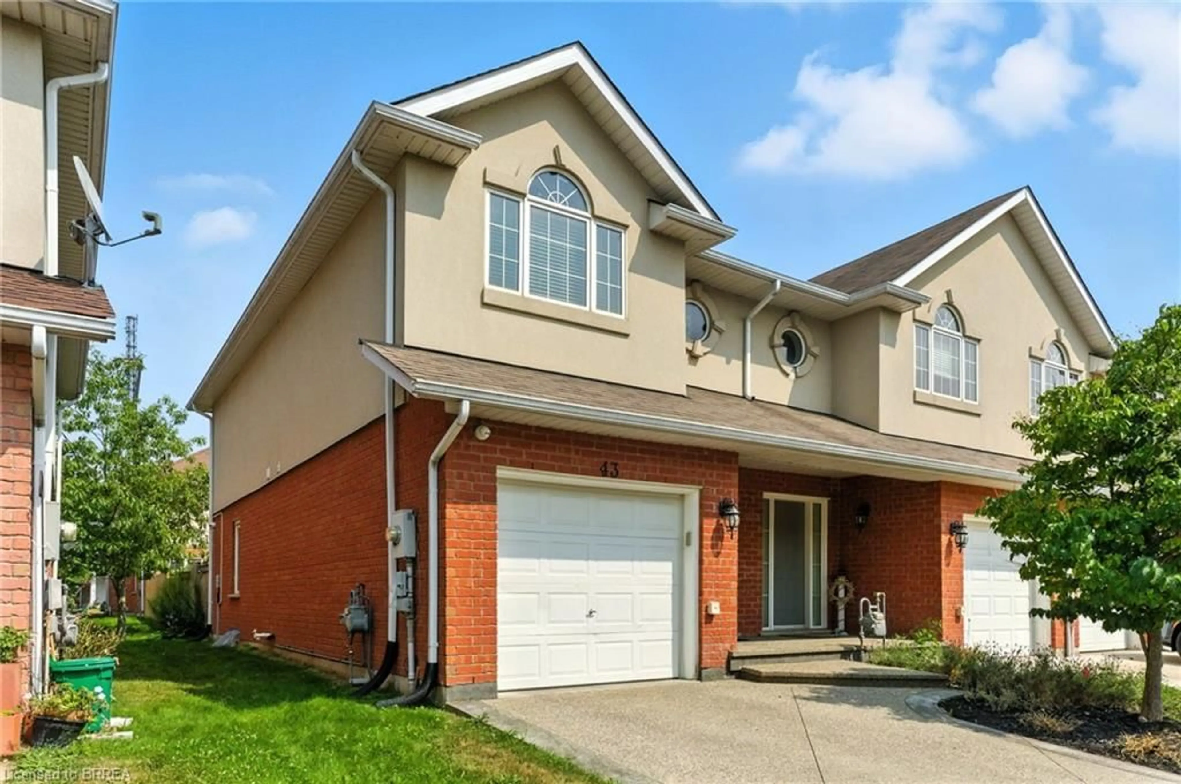 Home with brick exterior material, street for 20 Mcconkey Cres #43, Brantford Ontario N3S 0B9