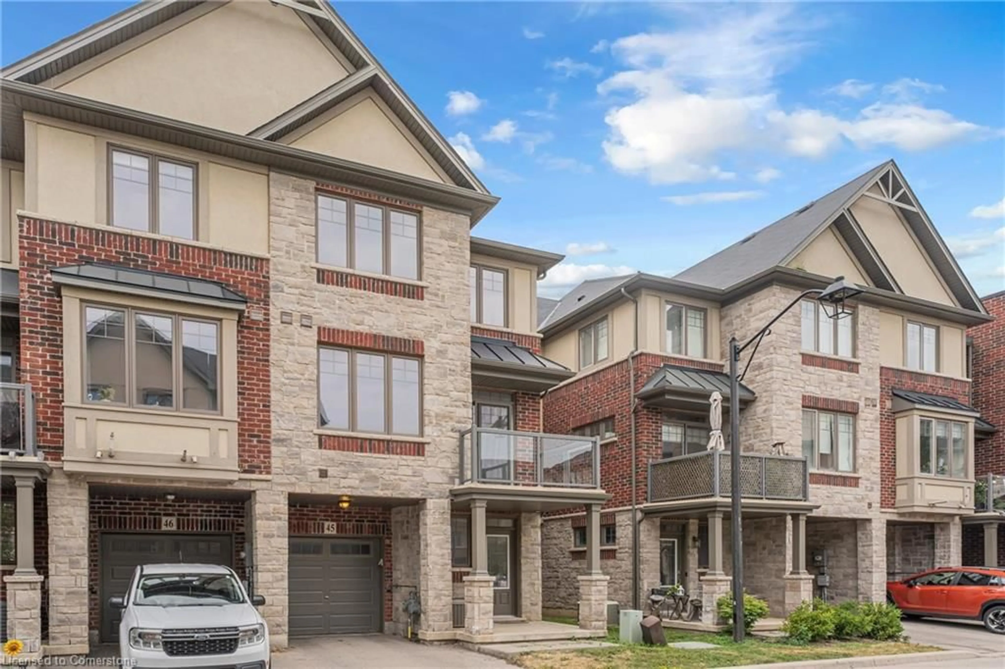 Home with brick exterior material, street for 1169 Garner Rd #45, Ancaster Ontario L9G 0G8