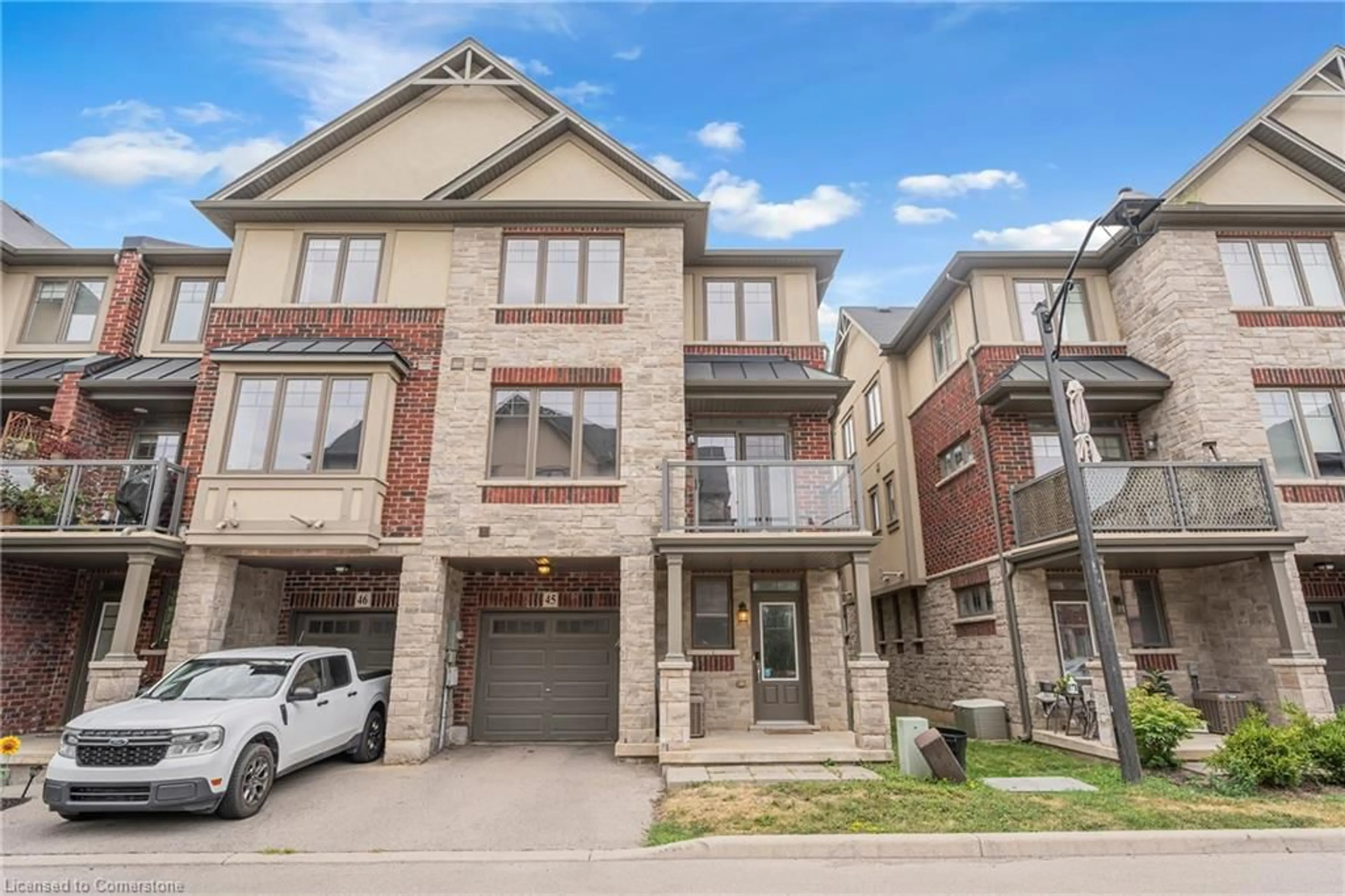 Home with brick exterior material, street for 1169 Garner Rd #45, Ancaster Ontario L9G 0G8