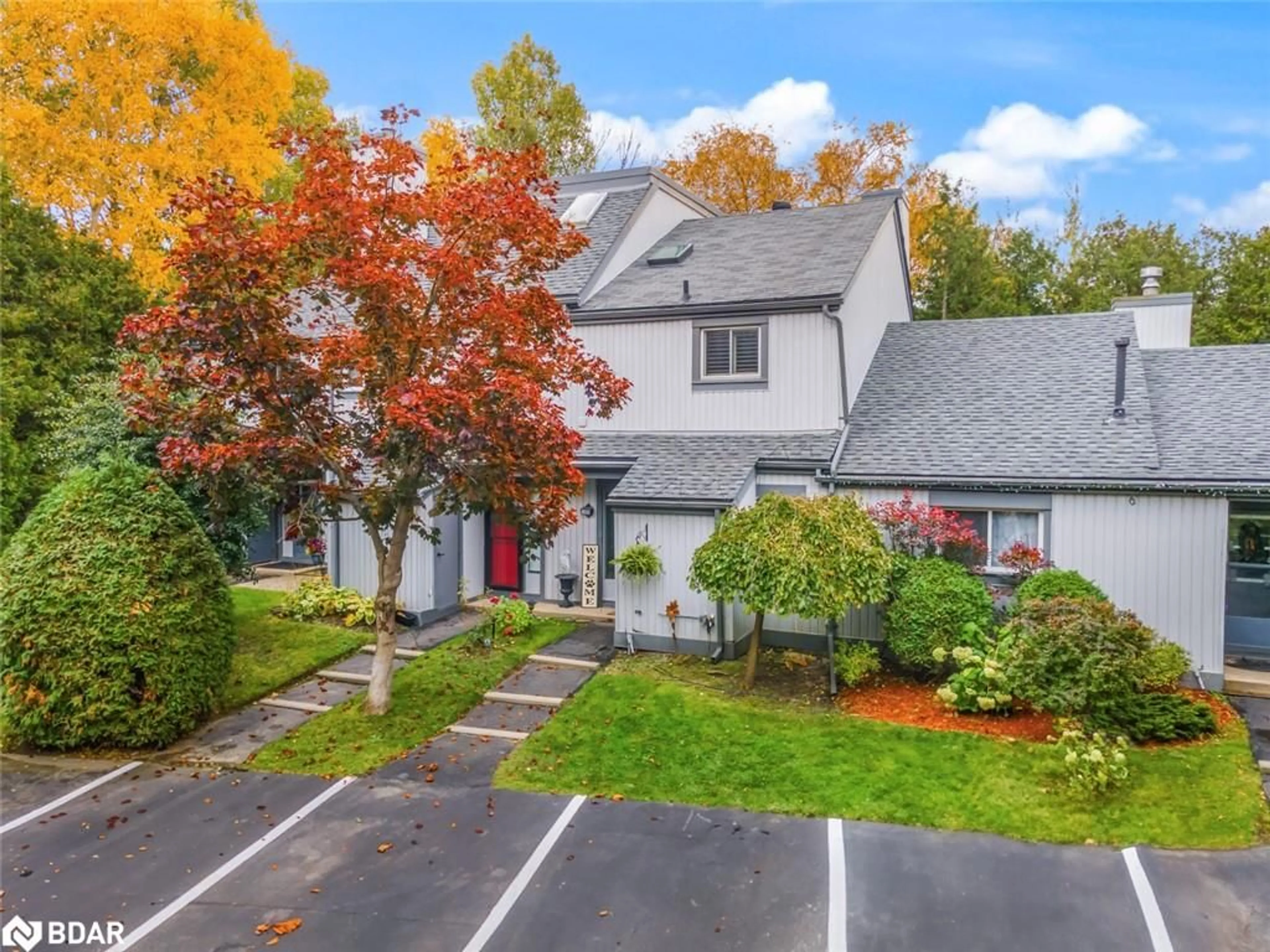 A pic from outside/outdoor area/front of a property/back of a property/a pic from drone, street for #403 - 12 Dawson Dr, Collingwood Ontario L9Y 5B4