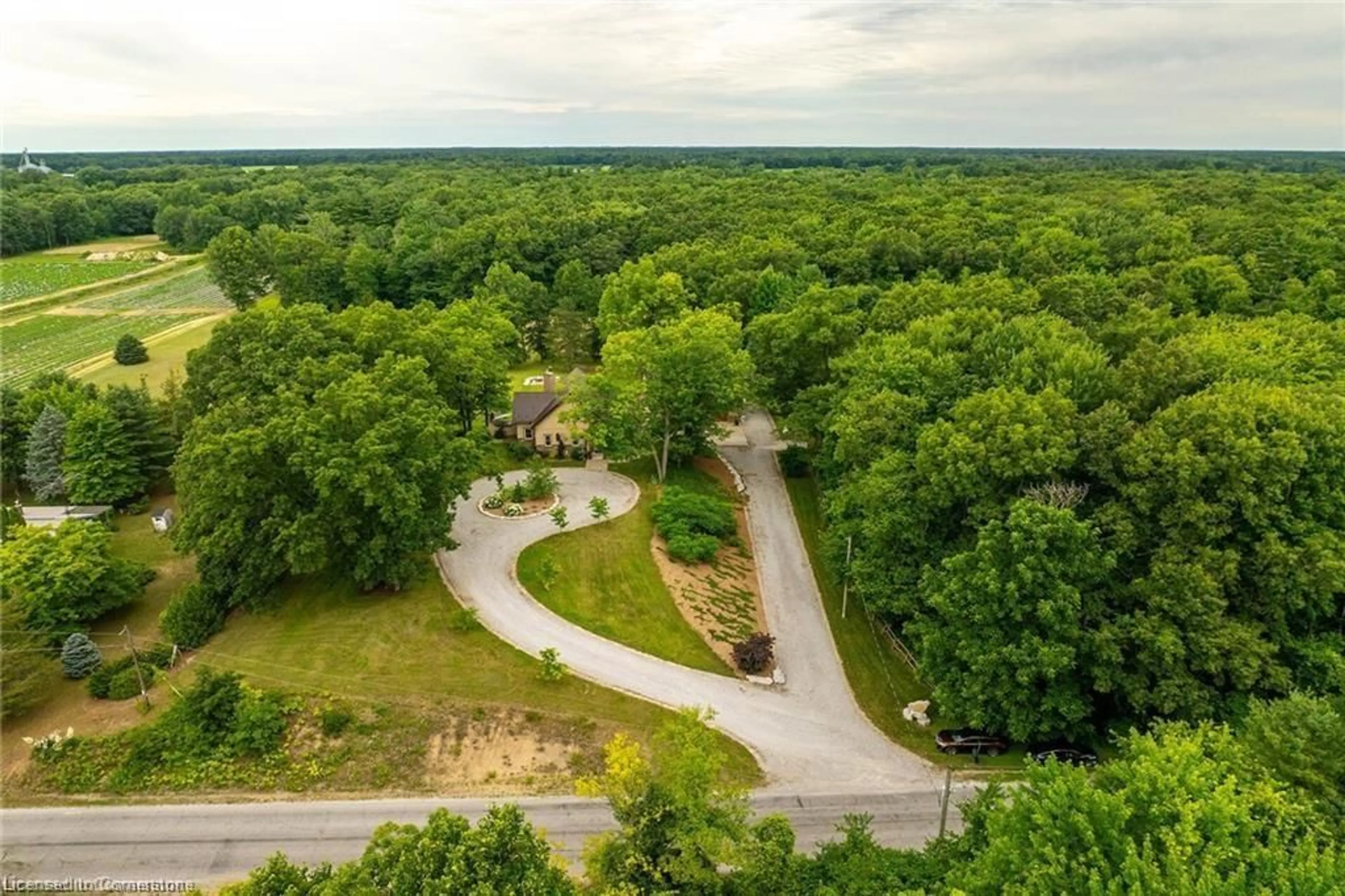 A pic from outside/outdoor area/front of a property/back of a property/a pic from drone, forest/trees view for 971 Char'ville Rd 10 Rd, Simcoe Ontario N3Y 4J9