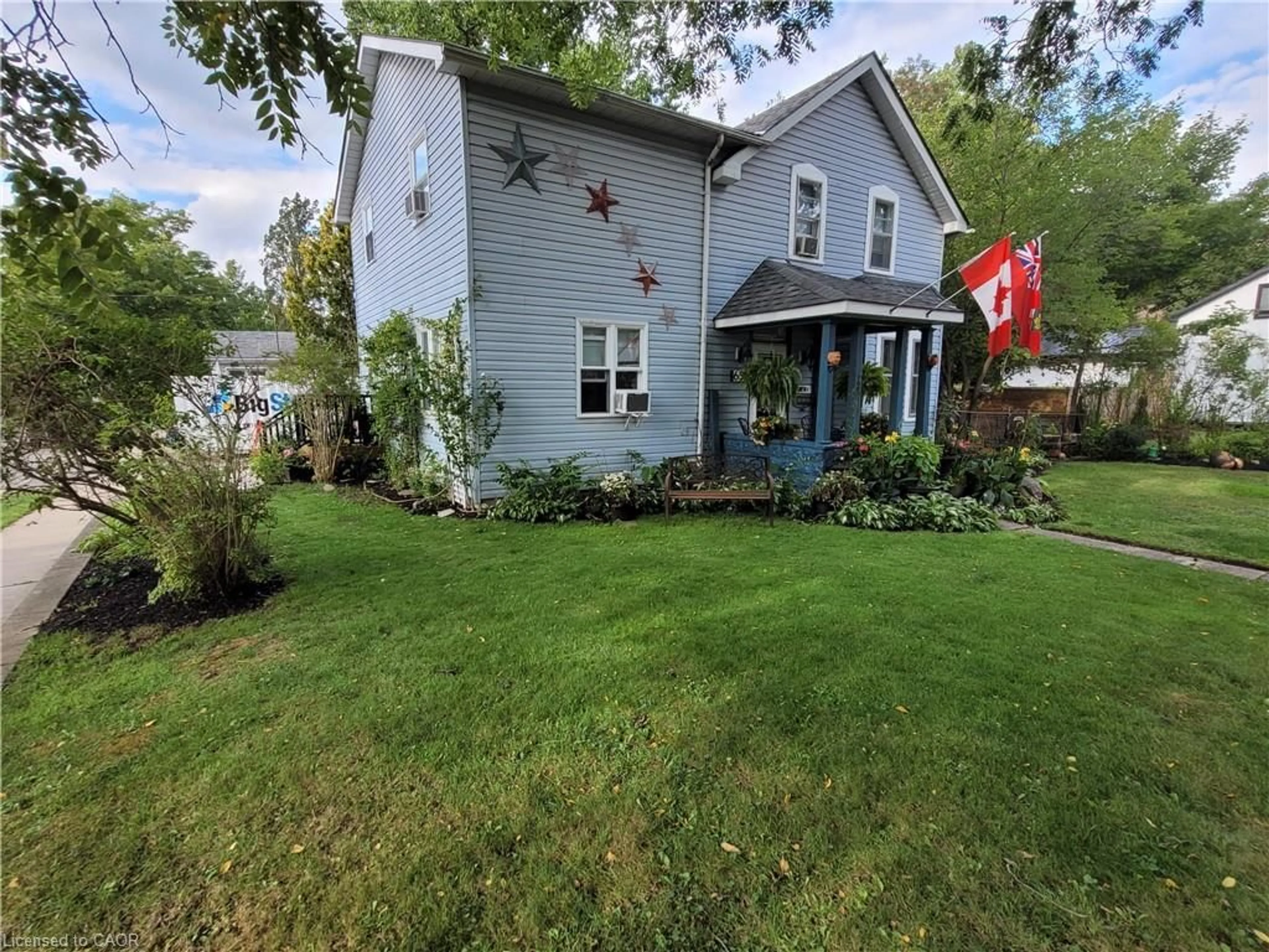 A pic from outside/outdoor area/front of a property/back of a property/a pic from drone, street for 65 Mccall St, Simcoe Ontario N3Y 3M9