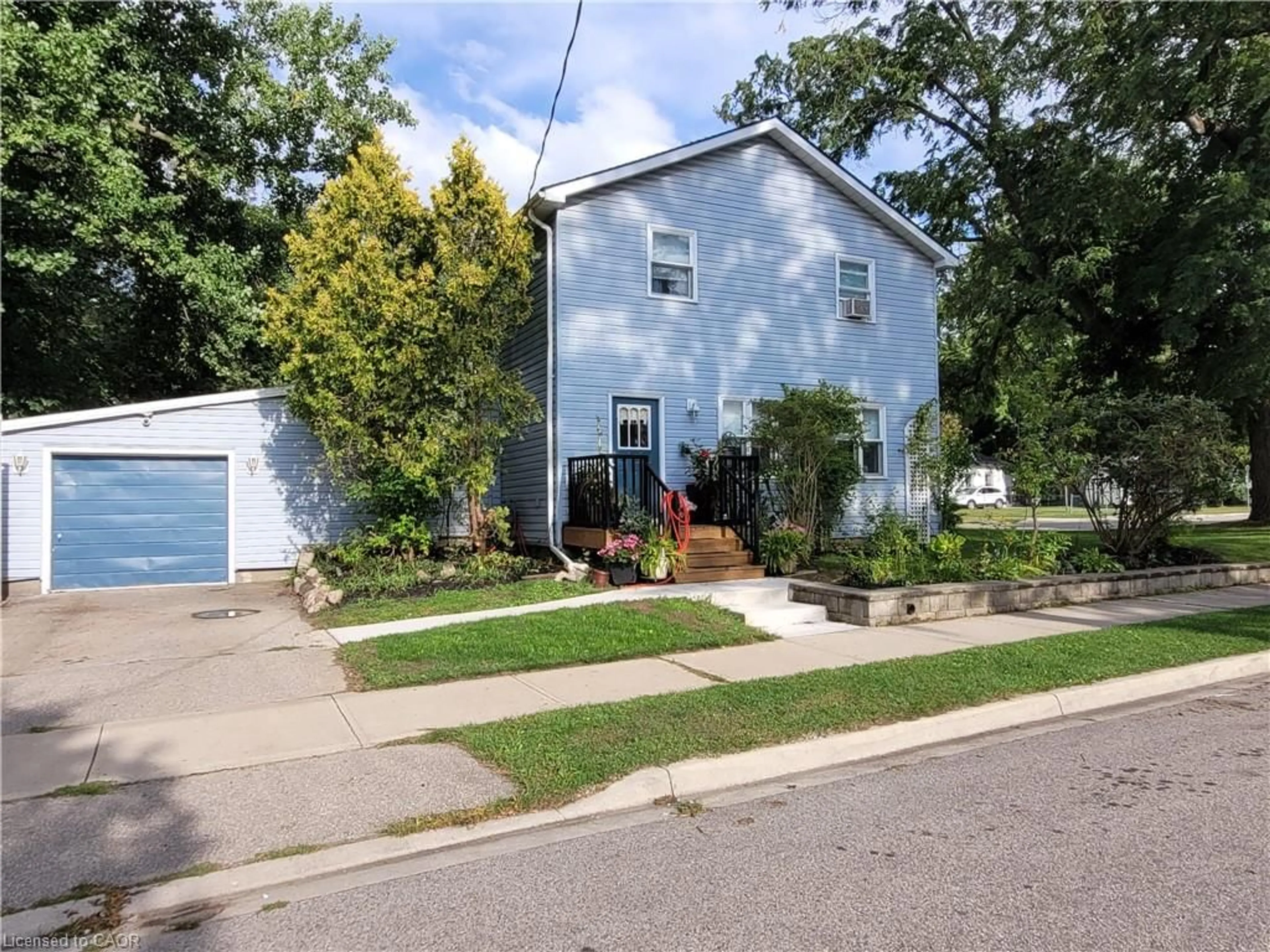 Home with vinyl exterior material, street for 65 Mccall St, Simcoe Ontario N3Y 3M9