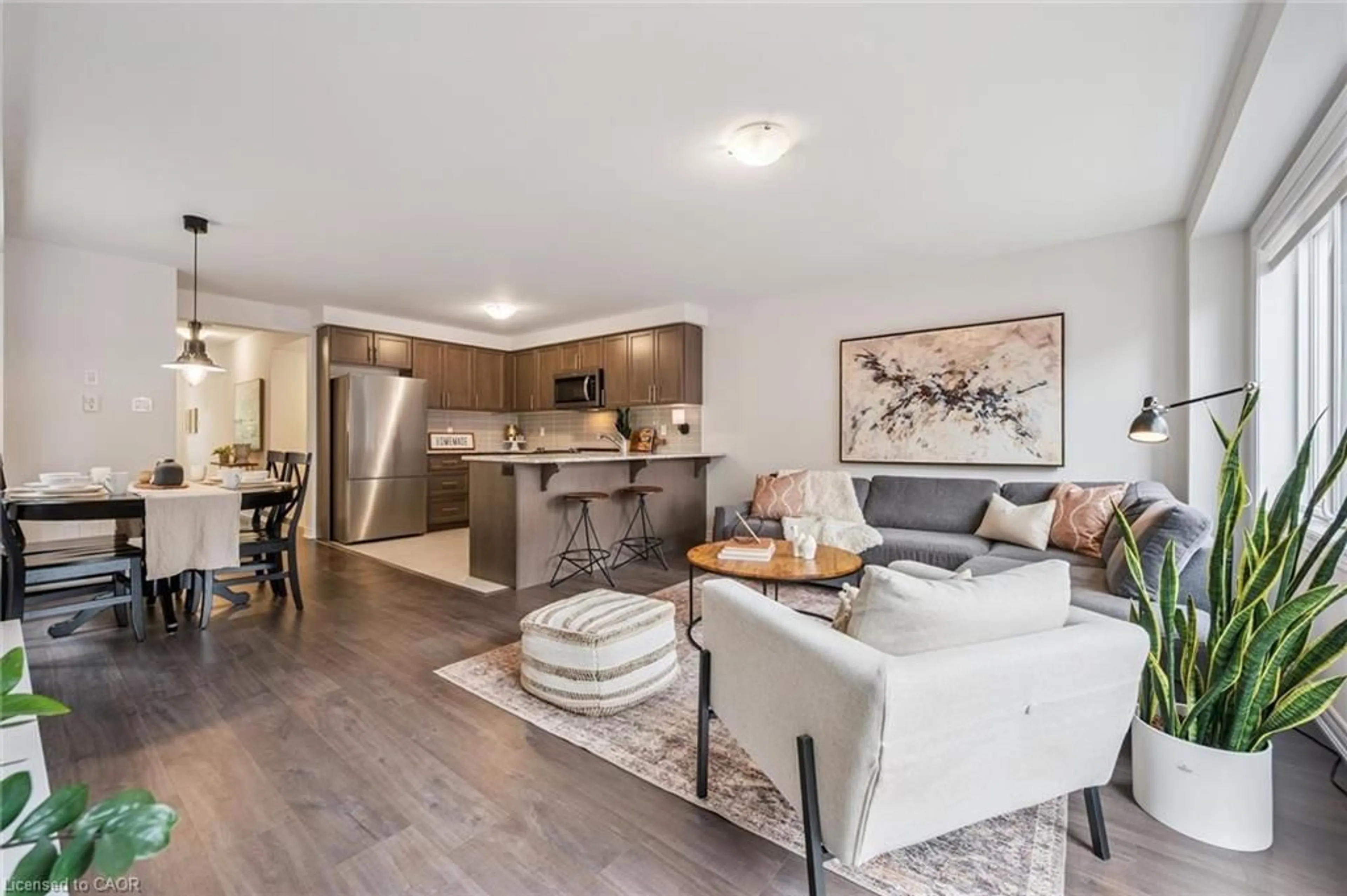 Open concept kitchen, wood/laminate floor for 32 Skinner Dr, Guelph Ontario N1E 0P7