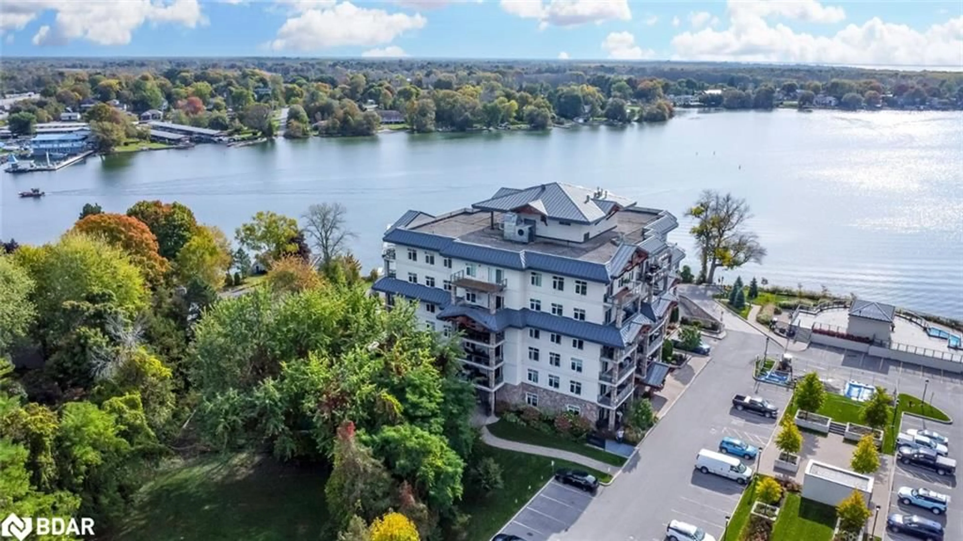 A pic from outside/outdoor area/front of a property/back of a property/a pic from drone, water/lake/river/ocean view for 80 Orchard Point Rd #604, Orillia Ontario L3V 1C6